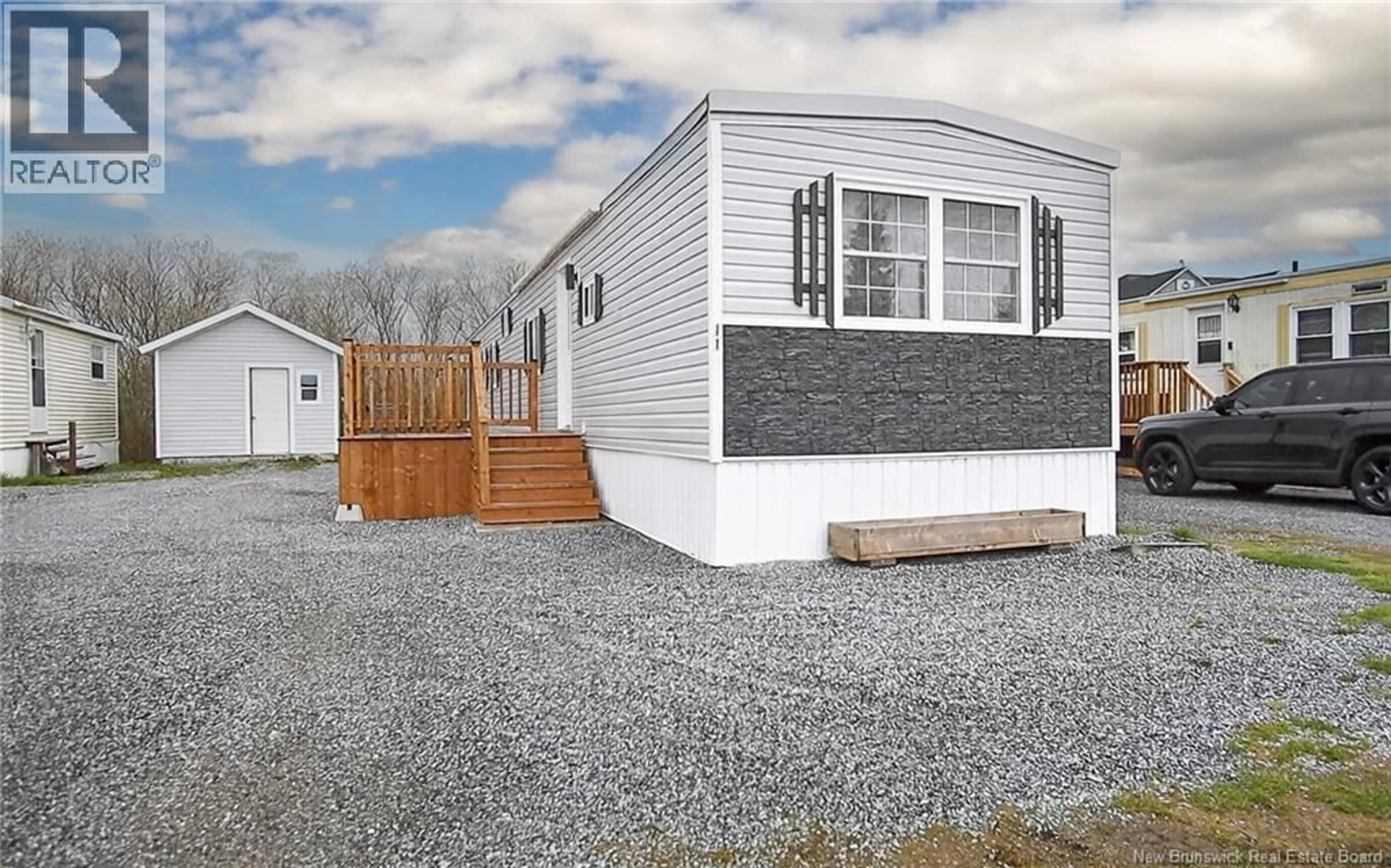 Home with vinyl exterior material, street for 11 KINGFISHER ROAD, Saint John New Brunswick E2J3W8