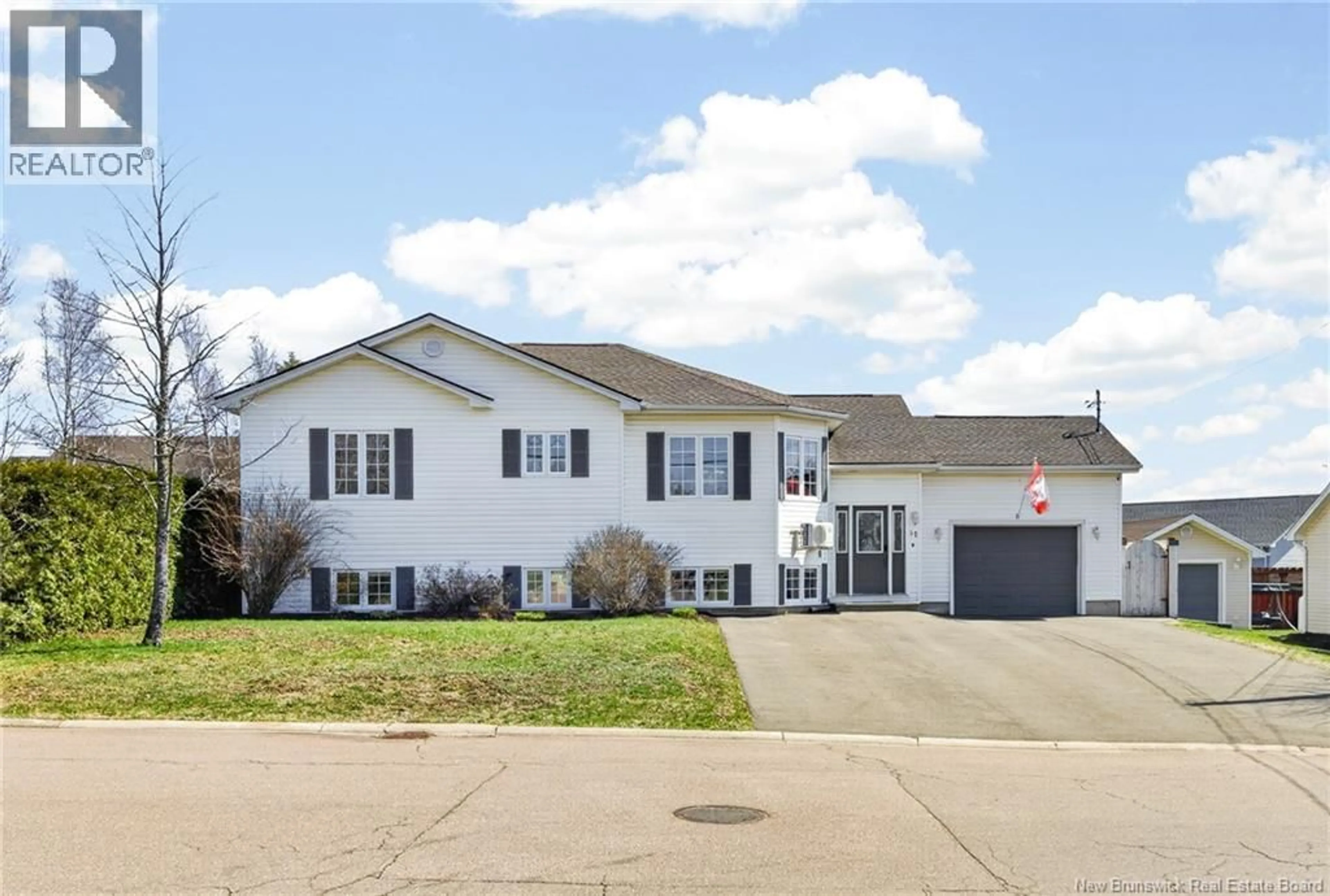 Home with vinyl exterior material, street for 51 PELAGIE STREET, Dieppe New Brunswick E1A7R6