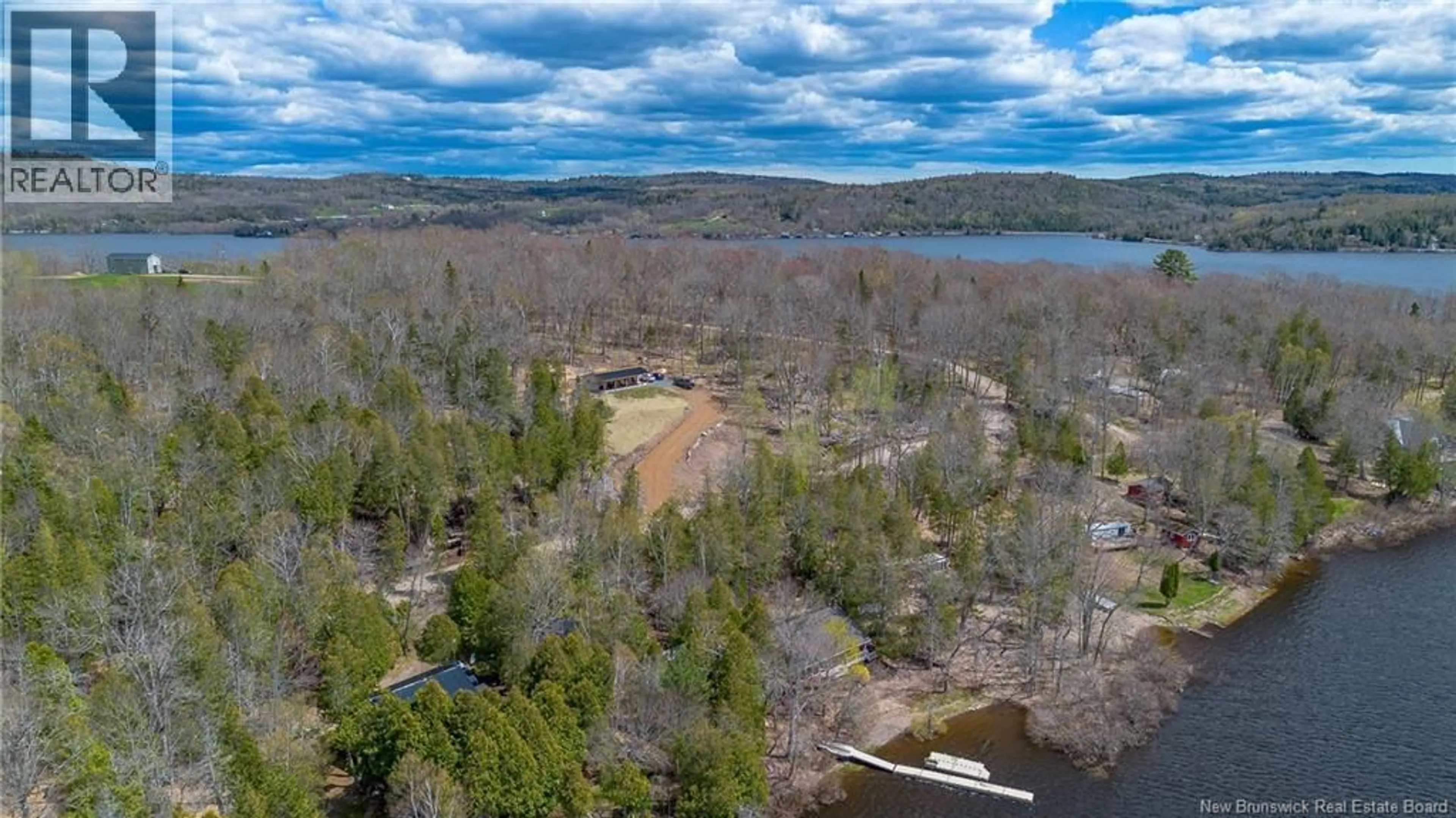 A pic from outside/outdoor area/front of a property/back of a property/a pic from drone, water/lake/river/ocean view for 97 BROWNS COVE ROAD, Kars New Brunswick E5T2Z5