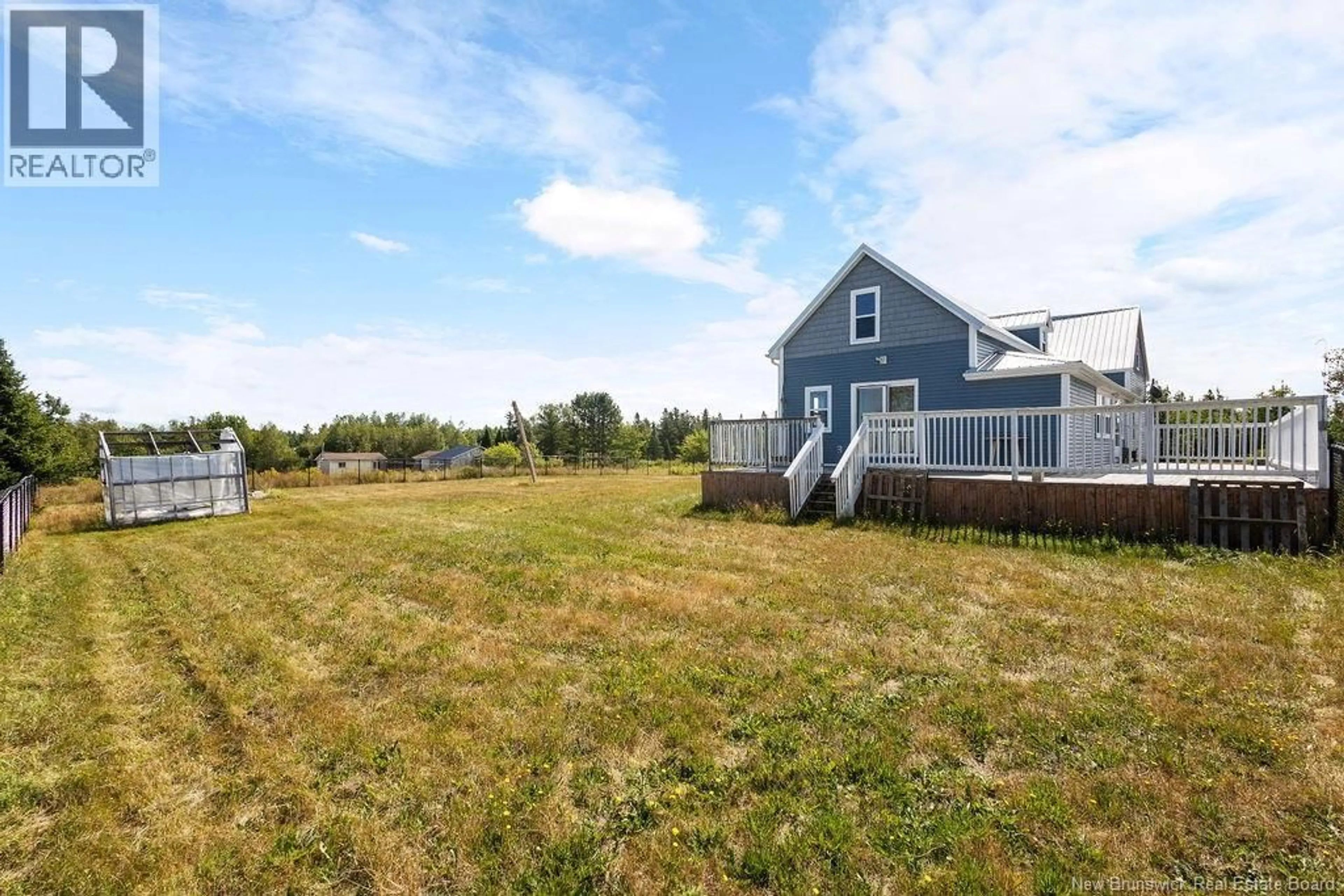 A pic from outside/outdoor area/front of a property/back of a property/a pic from drone, water/lake/river/ocean view for 70 SULLIVAN ROAD, Kouchibouguac New Brunswick E4X1L7