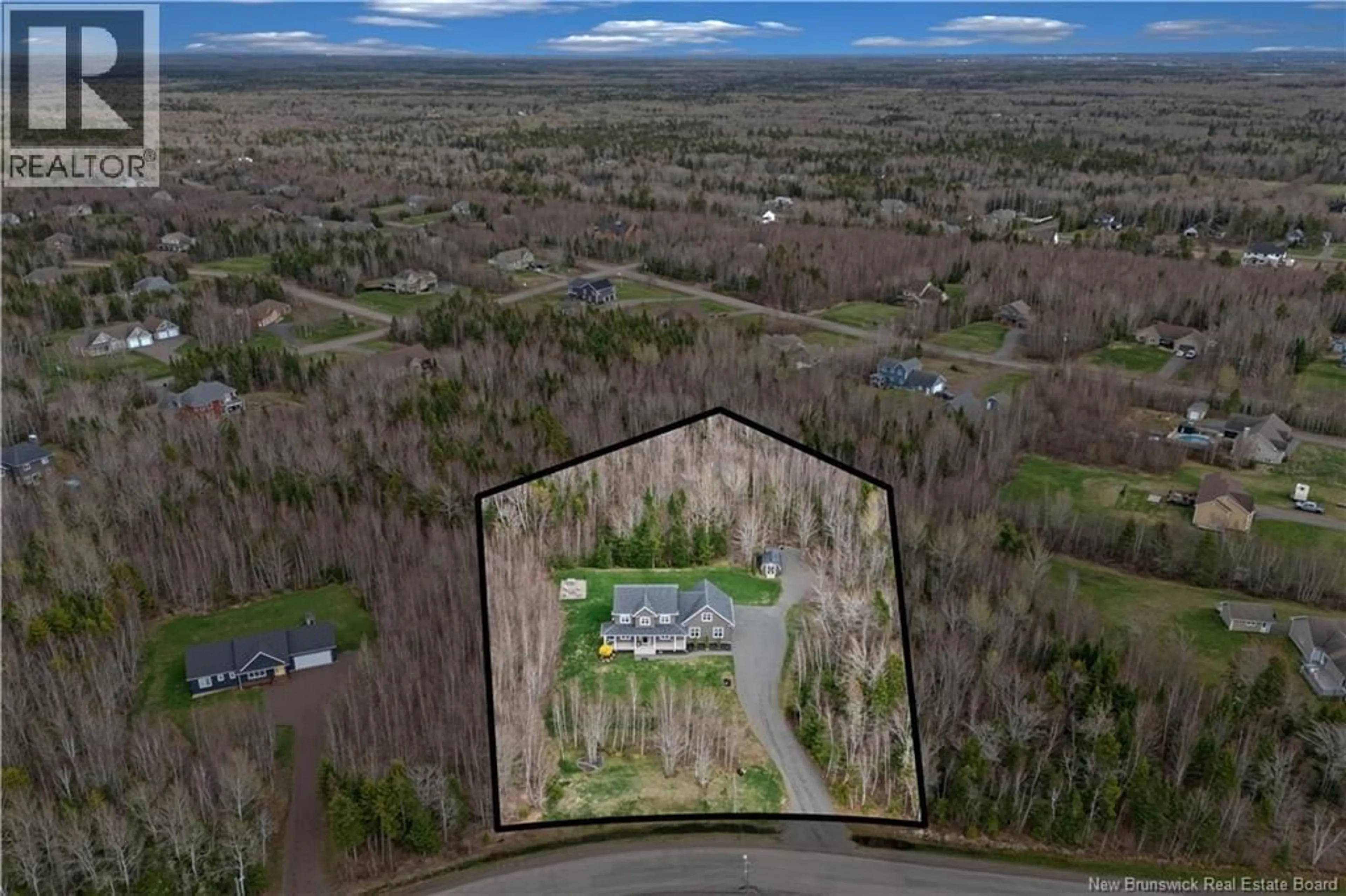 A pic from outside/outdoor area/front of a property/back of a property/a pic from drone, forest/trees view for 77 DANIEL DRIVE, Irishtown New Brunswick E1H0B2