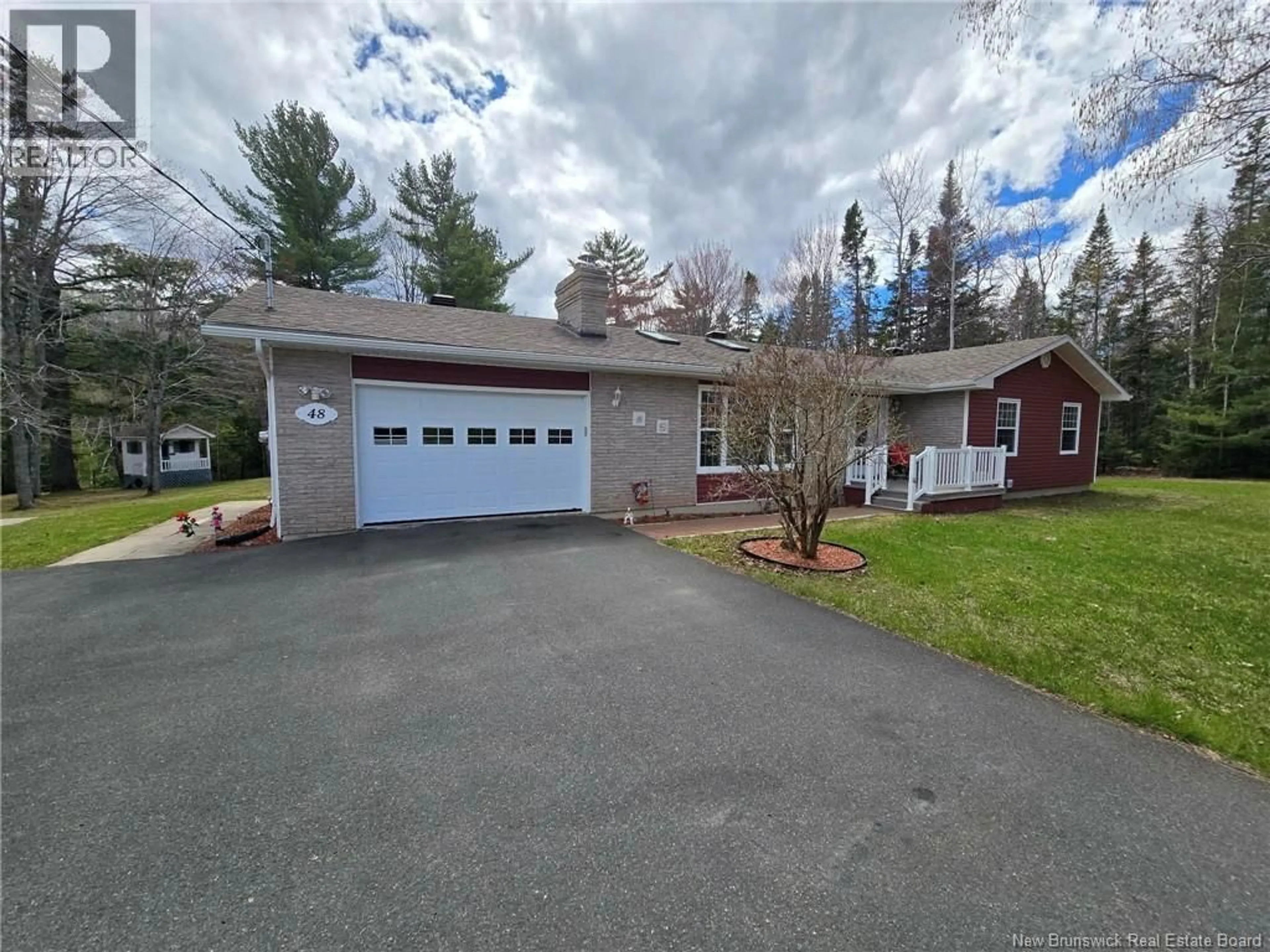 A pic from outside/outdoor area/front of a property/back of a property/a pic from drone, street for 48 MILTON, North Tetagouche New Brunswick E2A4Y7