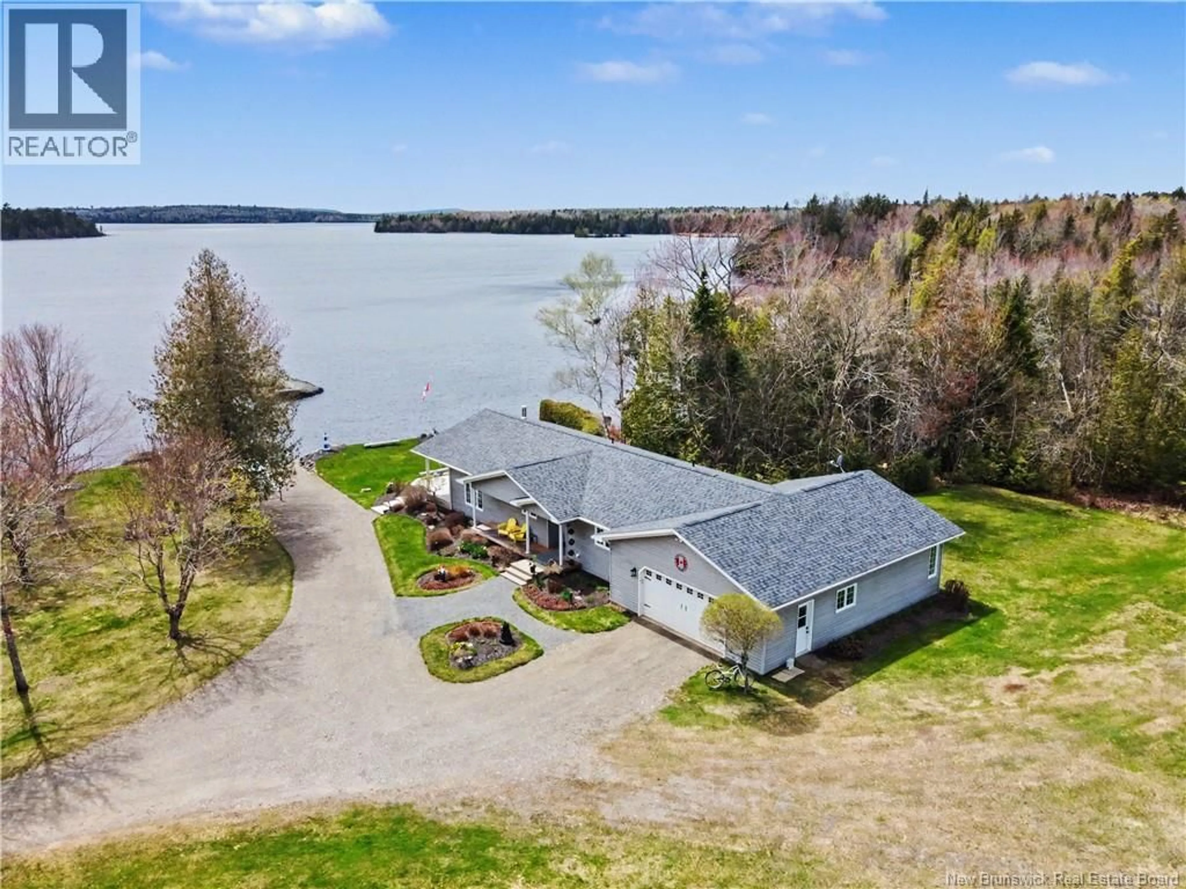 A pic from outside/outdoor area/front of a property/back of a property/a pic from drone, water/lake/river/ocean view for 49 FARRELL LANE, North Lake New Brunswick E6H2E3