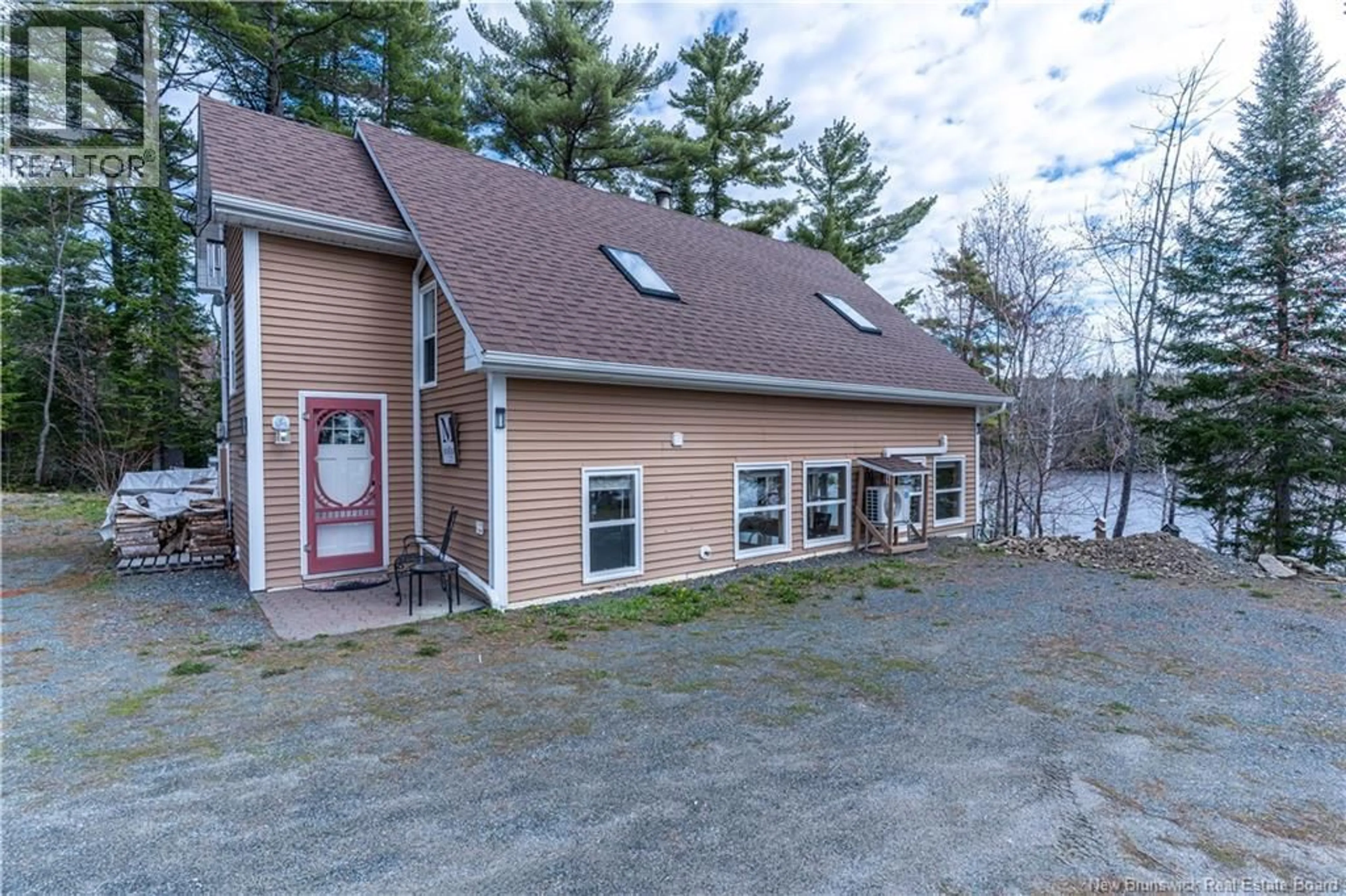 A pic from outside/outdoor area/front of a property/back of a property/a pic from drone, water/lake/river/ocean view for 65 JOHNSON ROAD, Miramichi New Brunswick E1V7H1