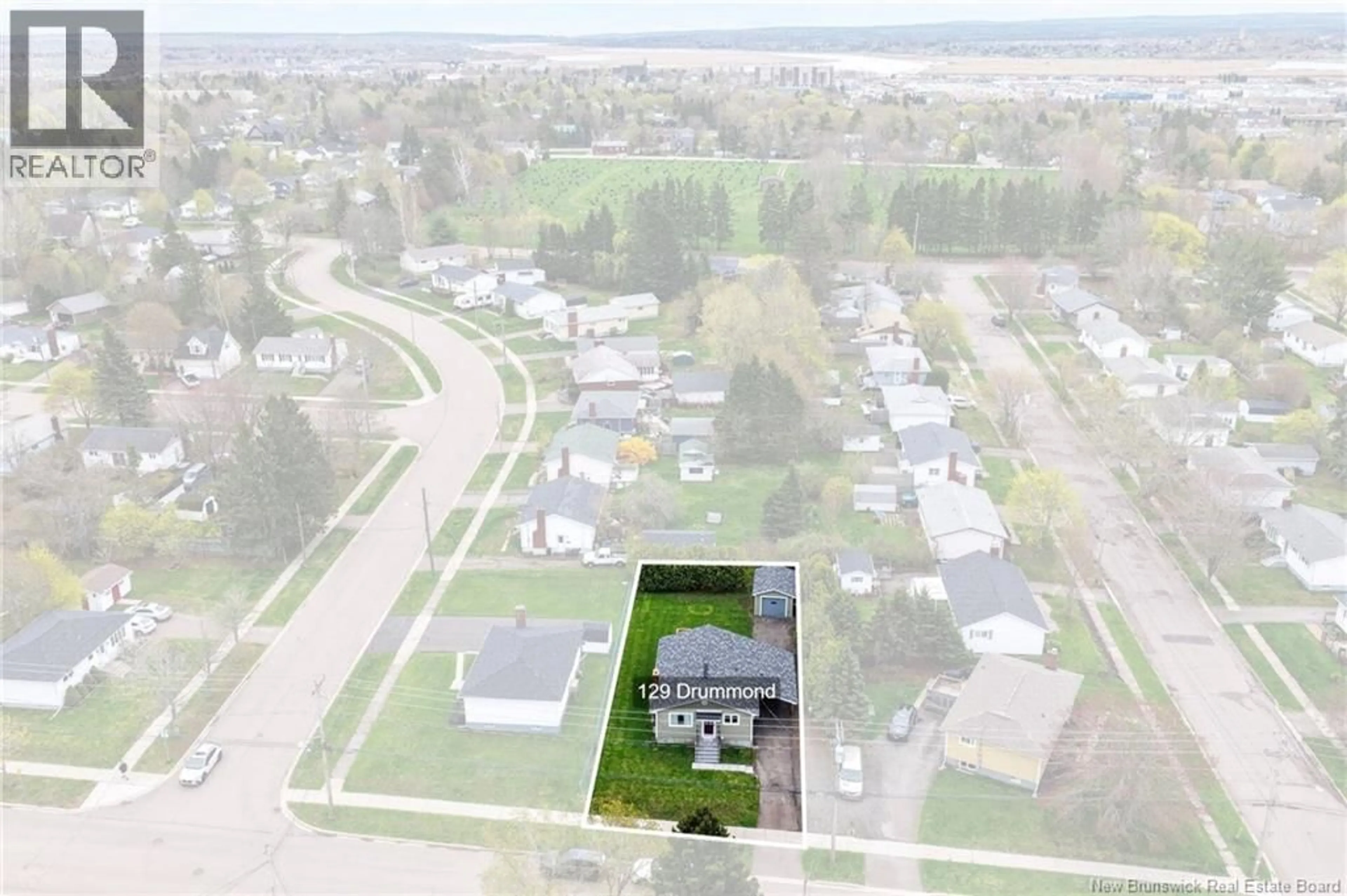 A pic from outside/outdoor area/front of a property/back of a property/a pic from drone, unknown for 129 DRUMMOND, Moncton New Brunswick E1A2Z5