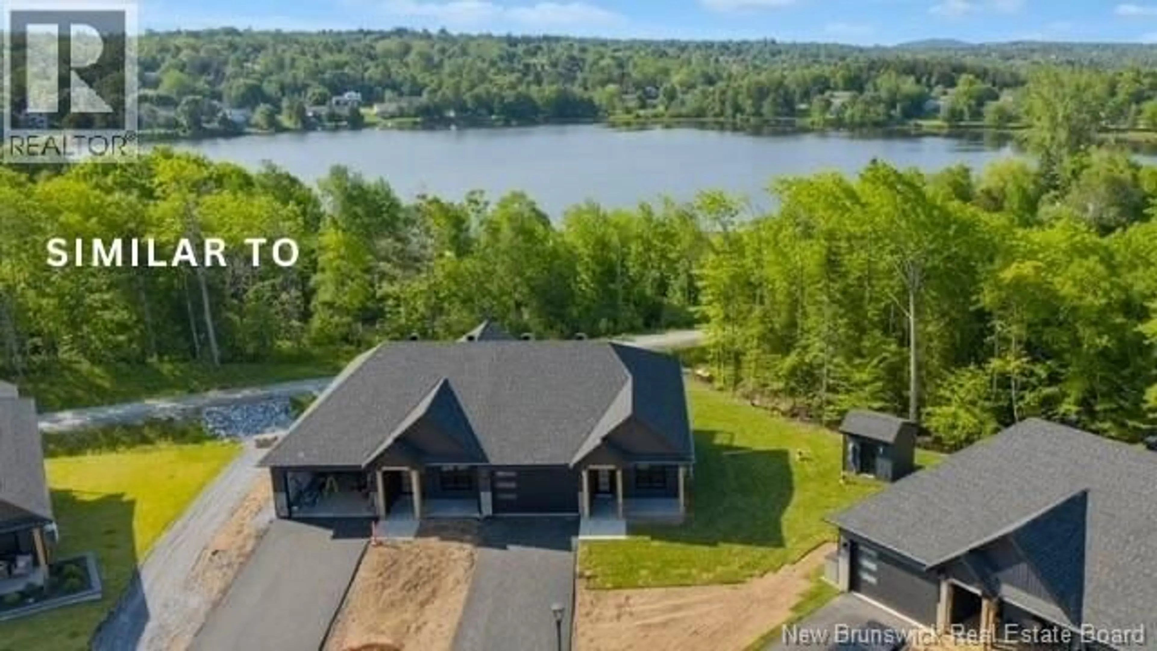 A pic from outside/outdoor area/front of a property/back of a property/a pic from drone, water/lake/river/ocean view for 13 - 22 WETMORE BOULEVARD, Quispamsis New Brunswick E2E0Y9