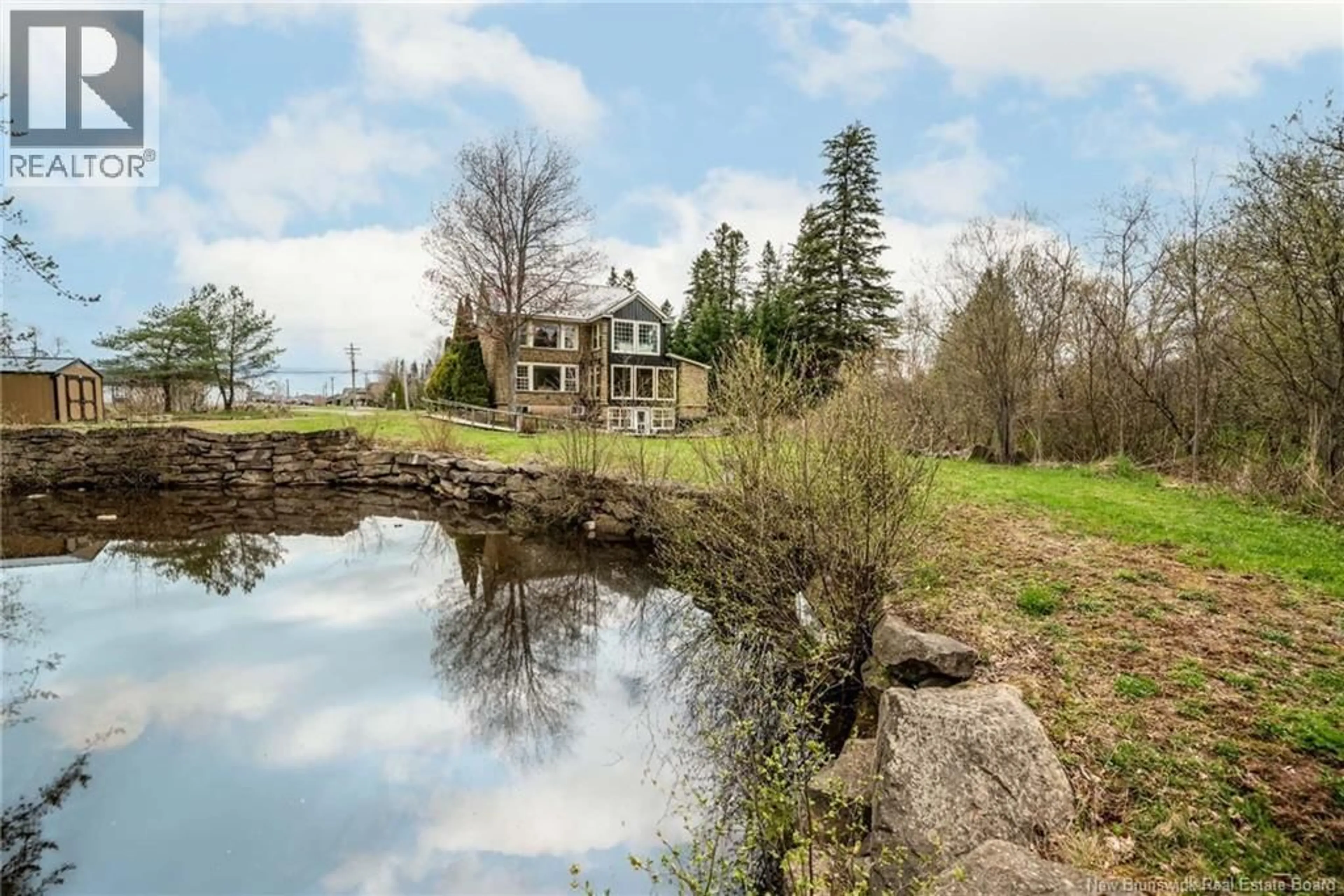A pic from outside/outdoor area/front of a property/back of a property/a pic from drone, water/lake/river/ocean view for 498 CHARTERSVILLE ROAD, Dieppe New Brunswick E1A1K6