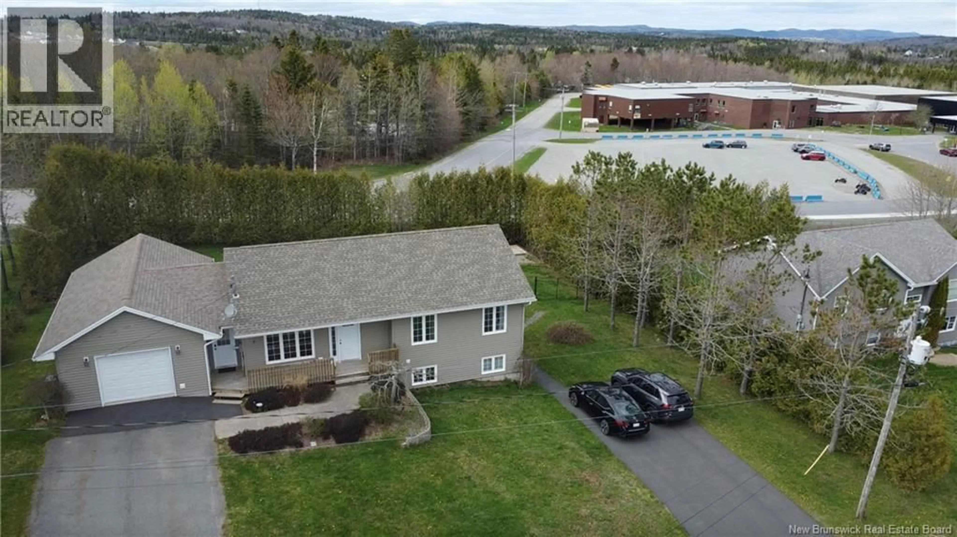 A pic from outside/outdoor area/front of a property/back of a property/a pic from drone, unknown for 7 MILLICAN DRIVE, Quispamsis New Brunswick E2E4V6