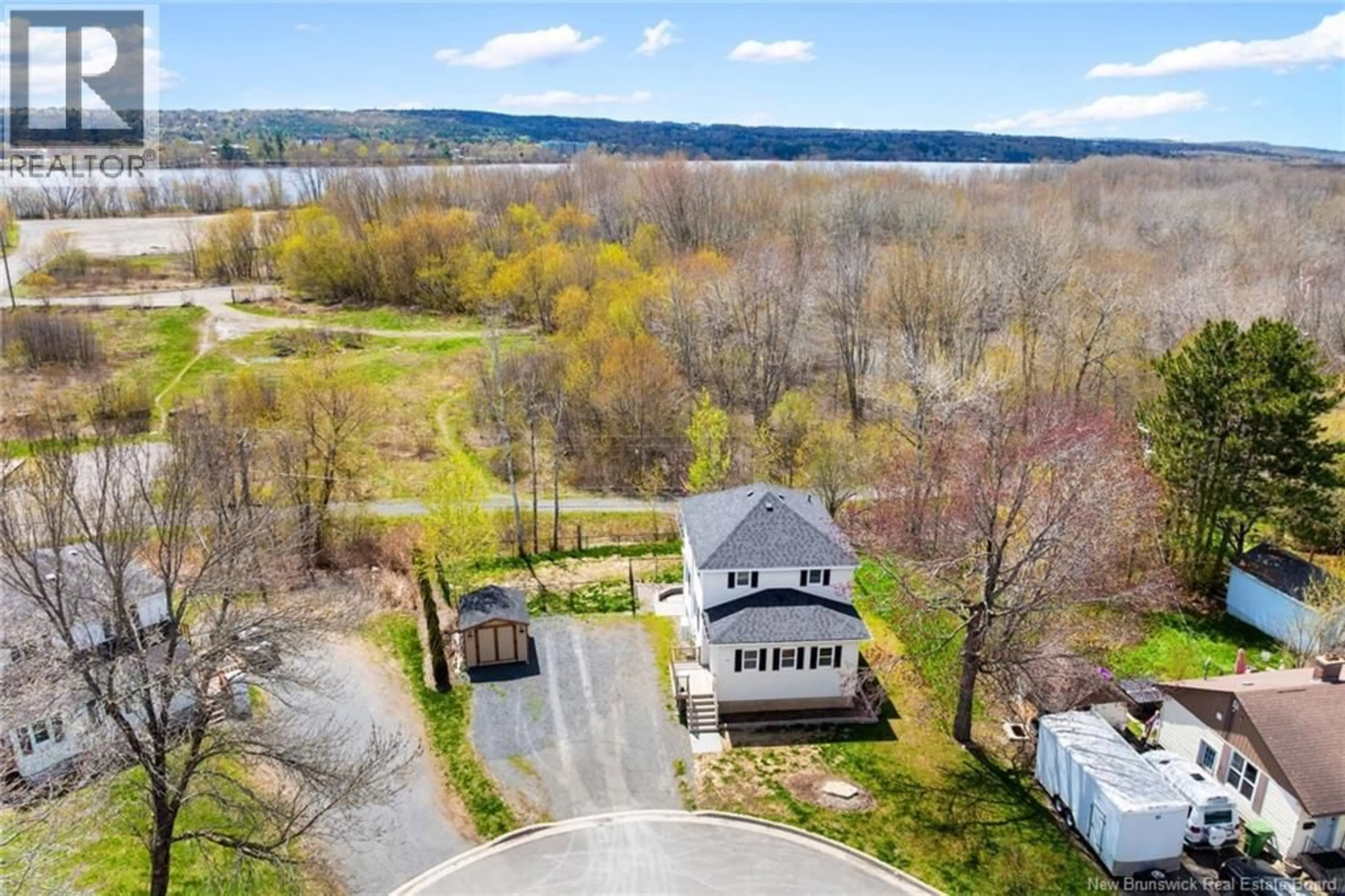 A pic from outside/outdoor area/front of a property/back of a property/a pic from drone, water/lake/river/ocean view for 4A HILLCOURT DRIVE, Fredericton New Brunswick E3A1S1