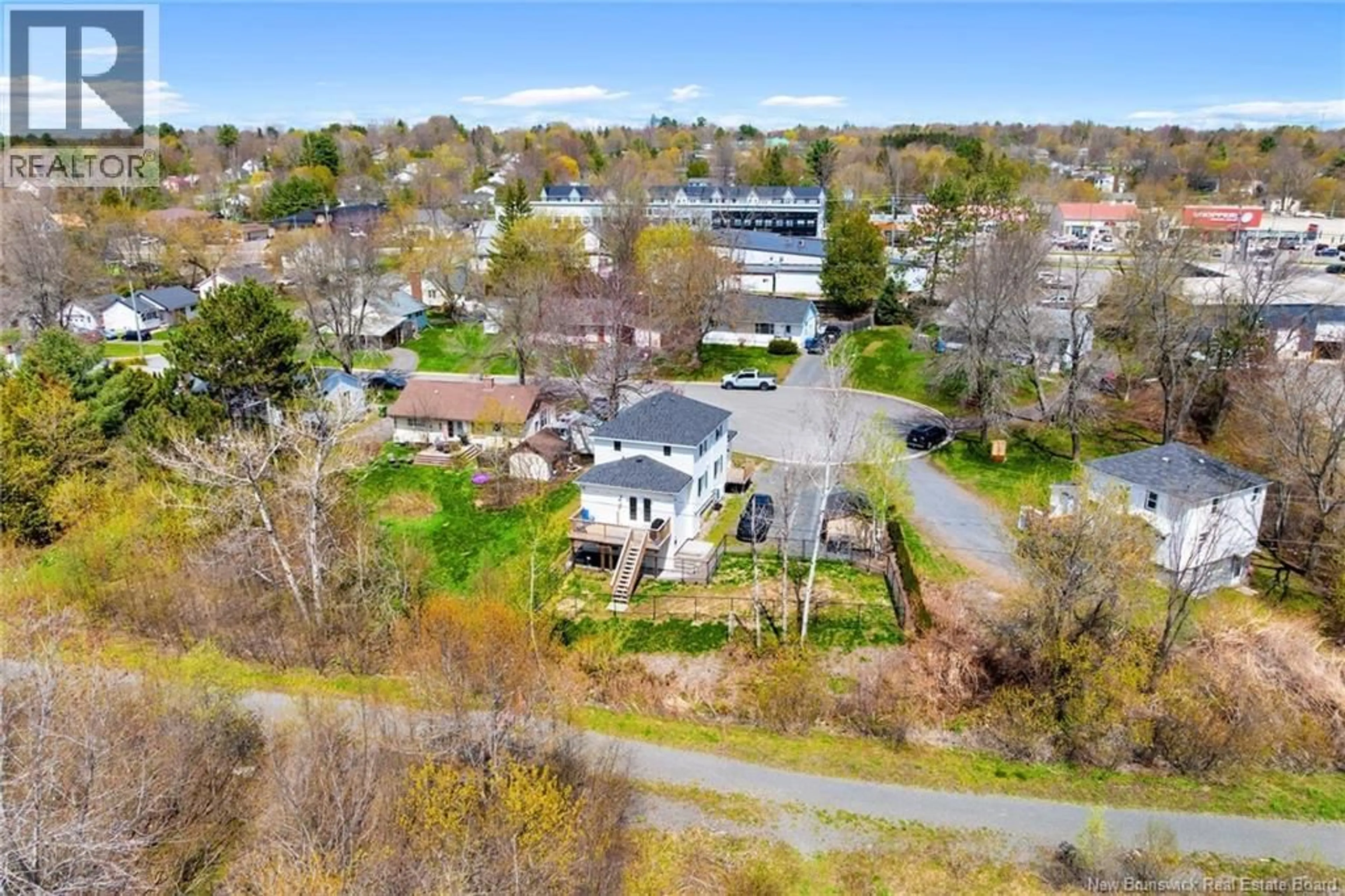 A pic from outside/outdoor area/front of a property/back of a property/a pic from drone, street for 4A HILLCOURT DRIVE, Fredericton New Brunswick E3A1S1