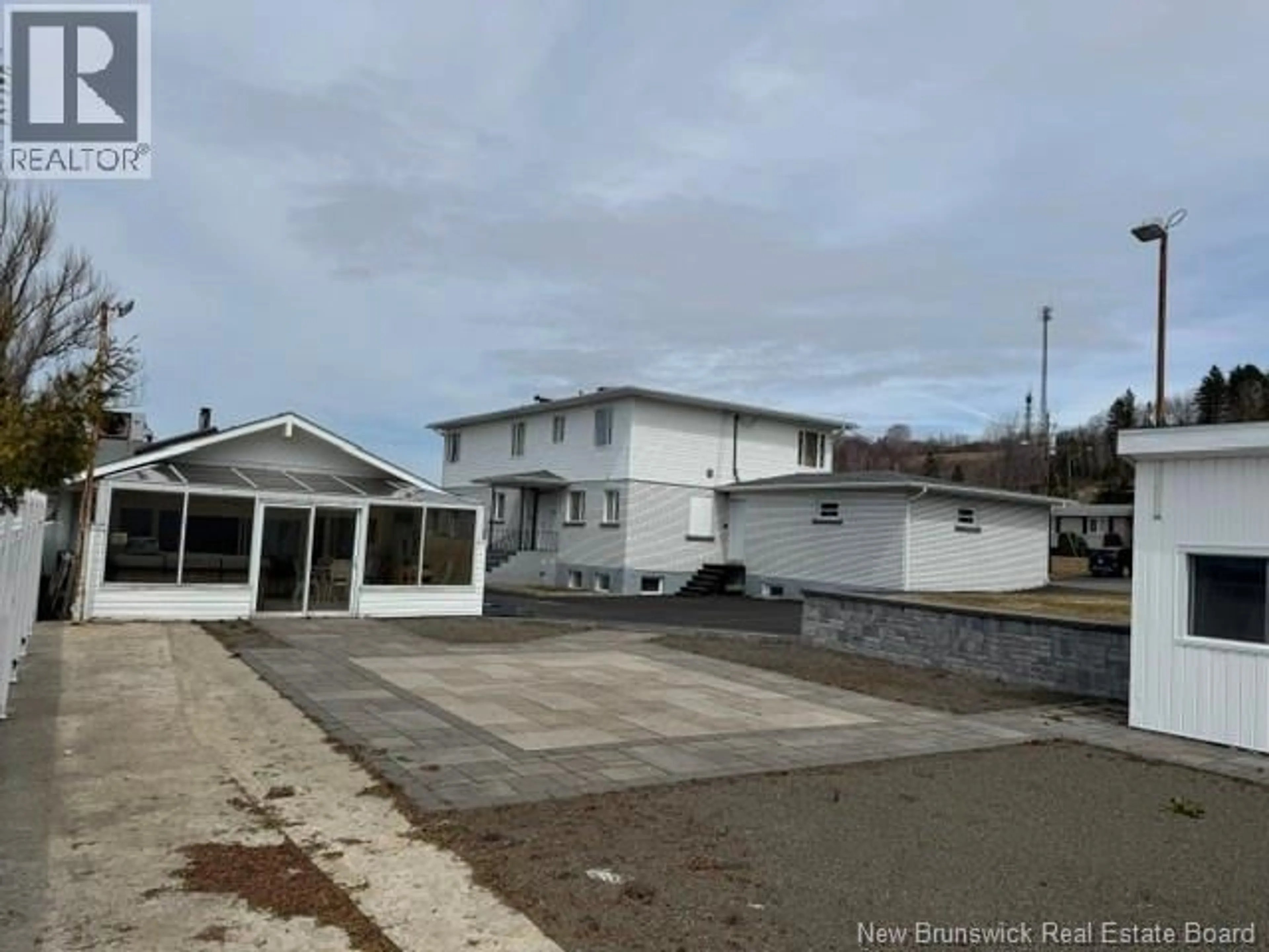 A pic from outside/outdoor area/front of a property/back of a property/a pic from drone, unknown for 64 FAIRVIEW STREET, Atholville New Brunswick E3N4L3