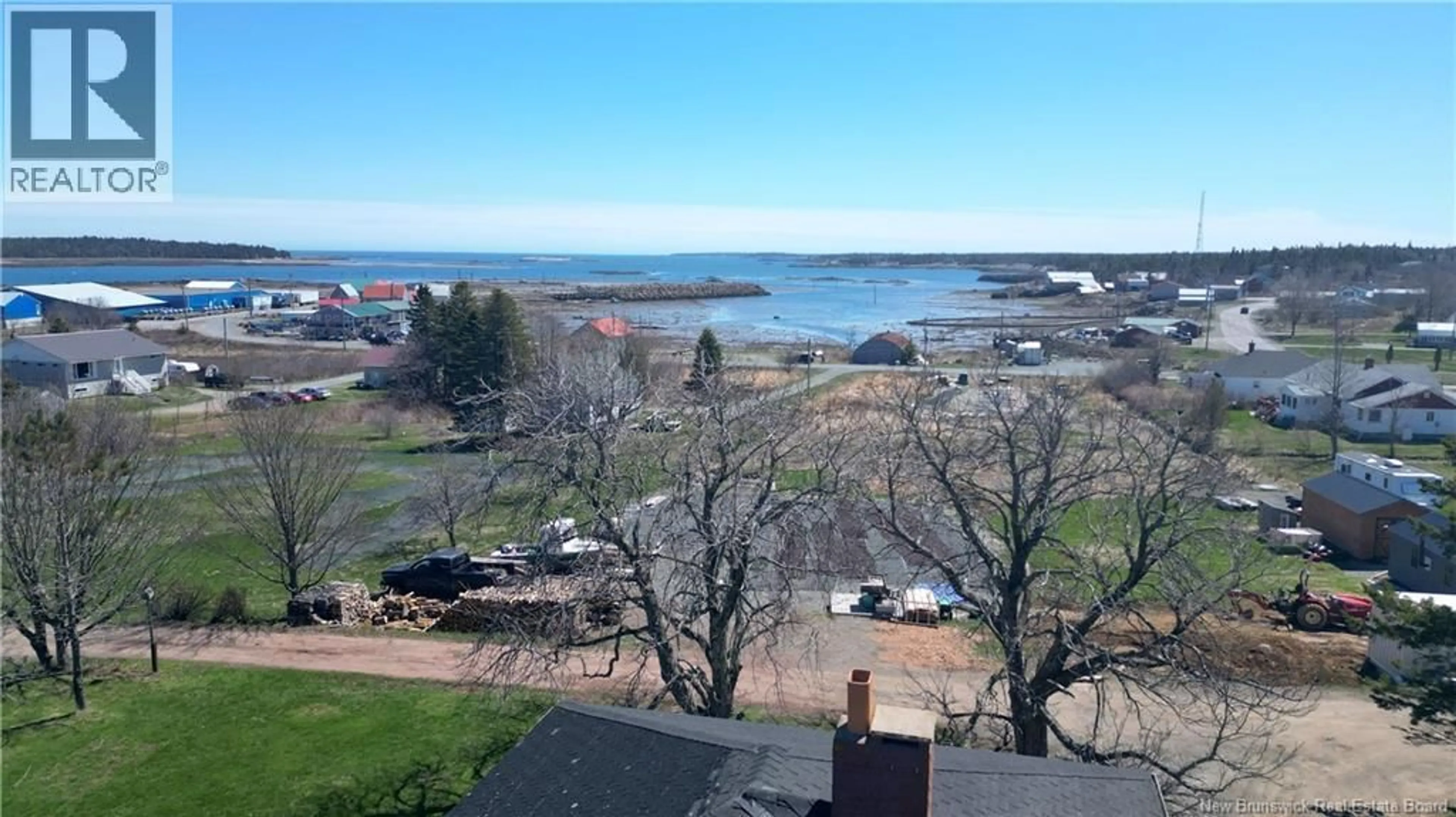 A pic from outside/outdoor area/front of a property/back of a property/a pic from drone, water/lake/river/ocean view for 9 HARVEY LANE, Grand Manan Island New Brunswick E5G2E7