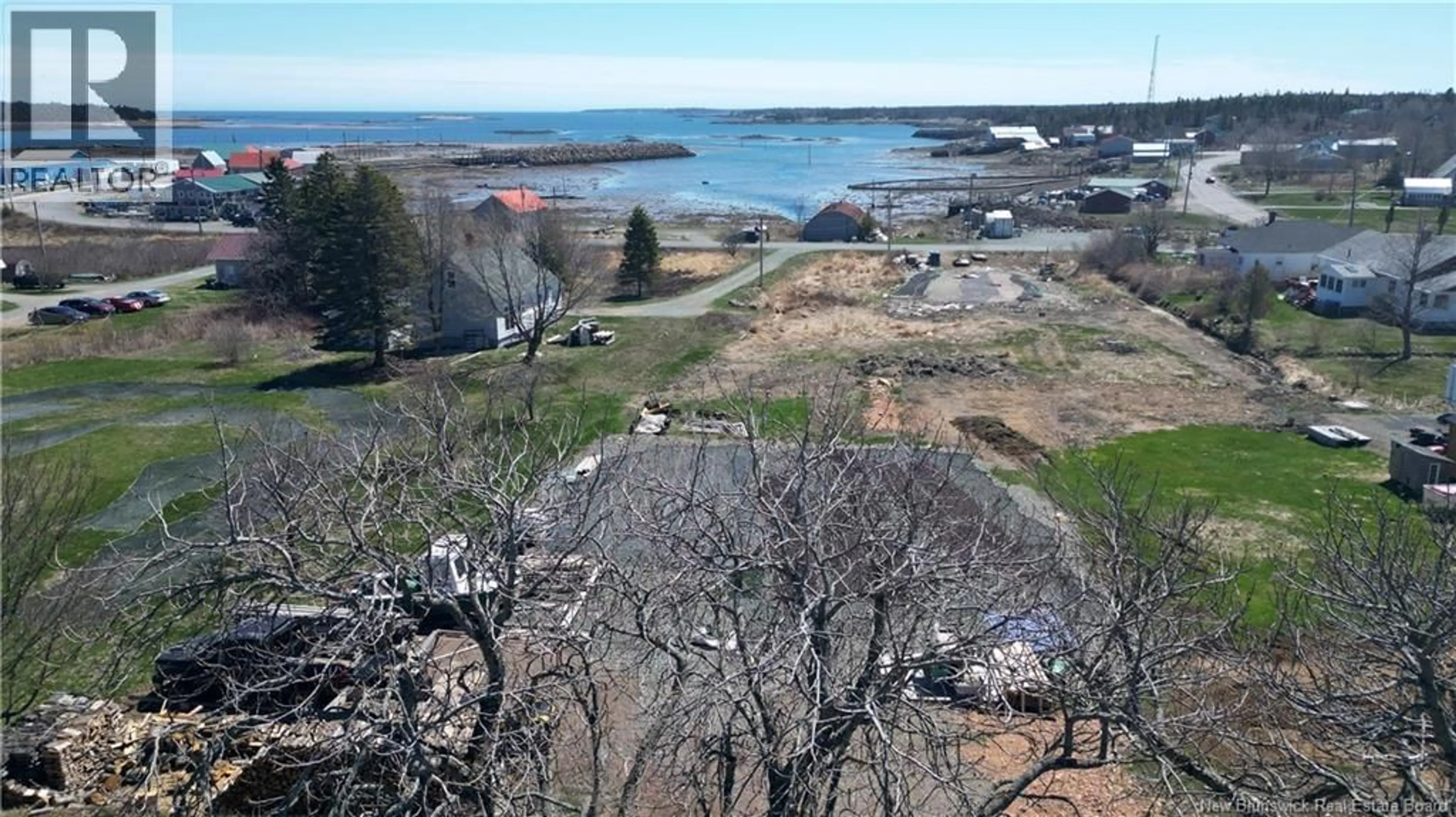 A pic from outside/outdoor area/front of a property/back of a property/a pic from drone, water/lake/river/ocean view for 9 HARVEY LANE, Grand Manan Island New Brunswick E5G2E7