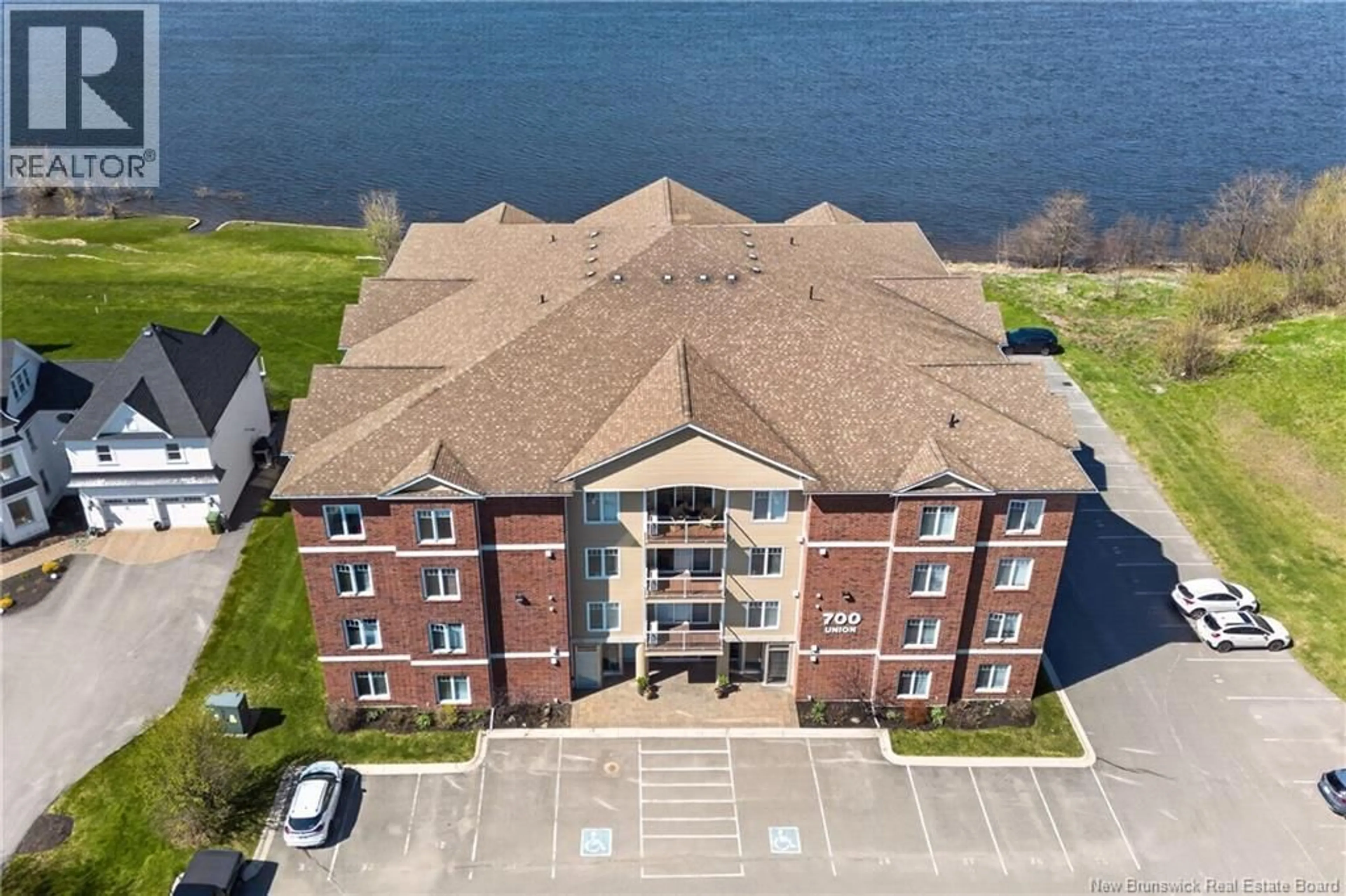 A pic from outside/outdoor area/front of a property/back of a property/a pic from drone, water/lake/river/ocean view for 308 - 700 UNION STREET, Fredericton New Brunswick E3A3N7