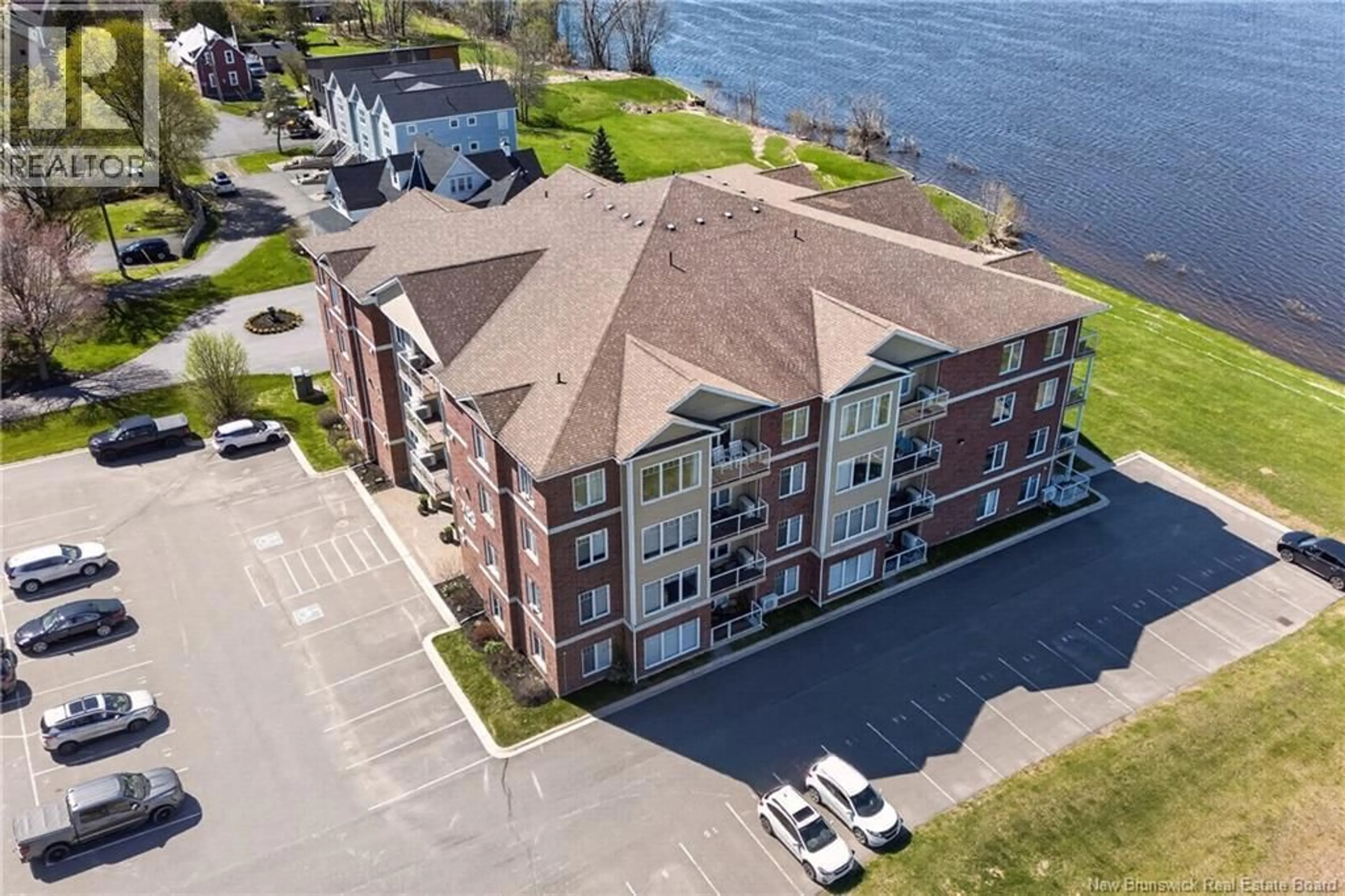 A pic from outside/outdoor area/front of a property/back of a property/a pic from drone, water/lake/river/ocean view for 308 - 700 UNION STREET, Fredericton New Brunswick E3A3N7