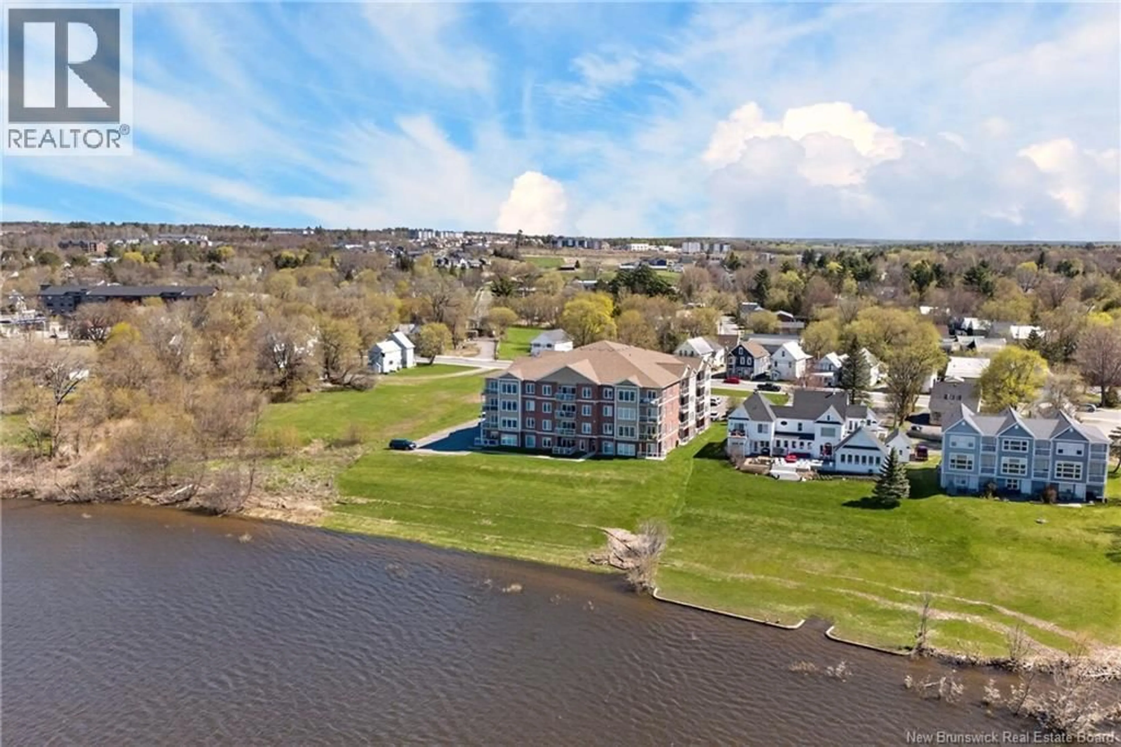 A pic from outside/outdoor area/front of a property/back of a property/a pic from drone, water/lake/river/ocean view for 308 - 700 UNION STREET, Fredericton New Brunswick E3A3N7