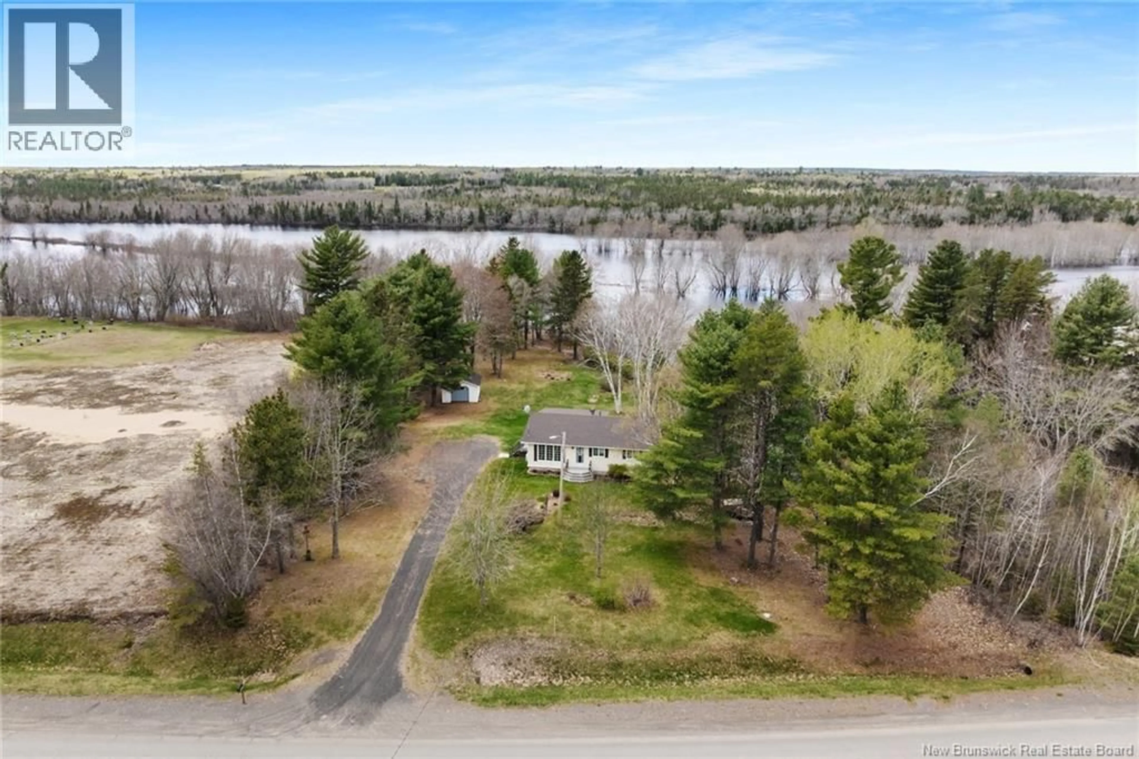 A pic from outside/outdoor area/front of a property/back of a property/a pic from drone, water/lake/river/ocean view for 4856 ROUTE 123, Chipman New Brunswick E4A2C1
