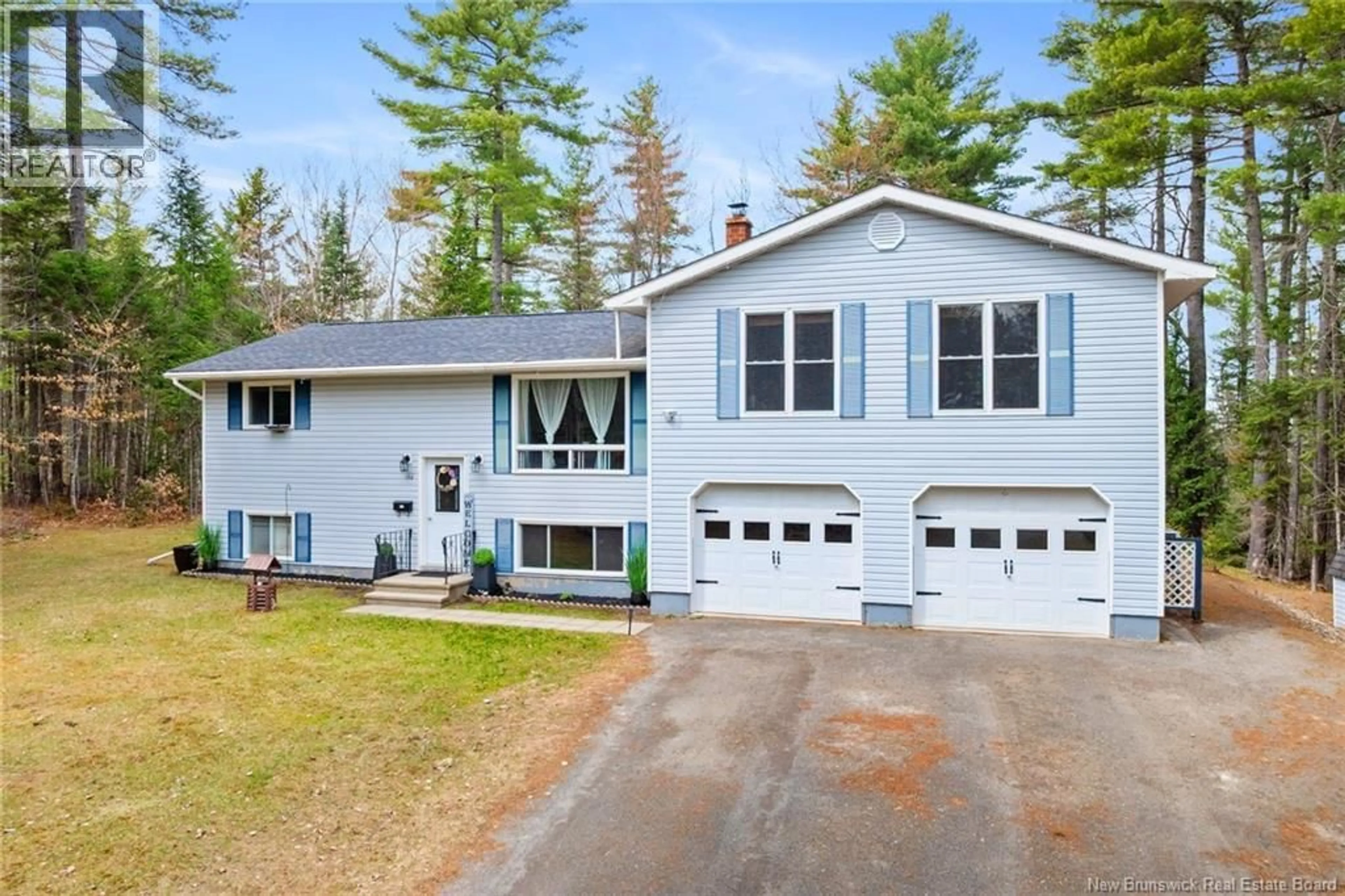 Home with vinyl exterior material, street for 152 RAINBOW DRIVE, Charters Settlement New Brunswick E3C1V1