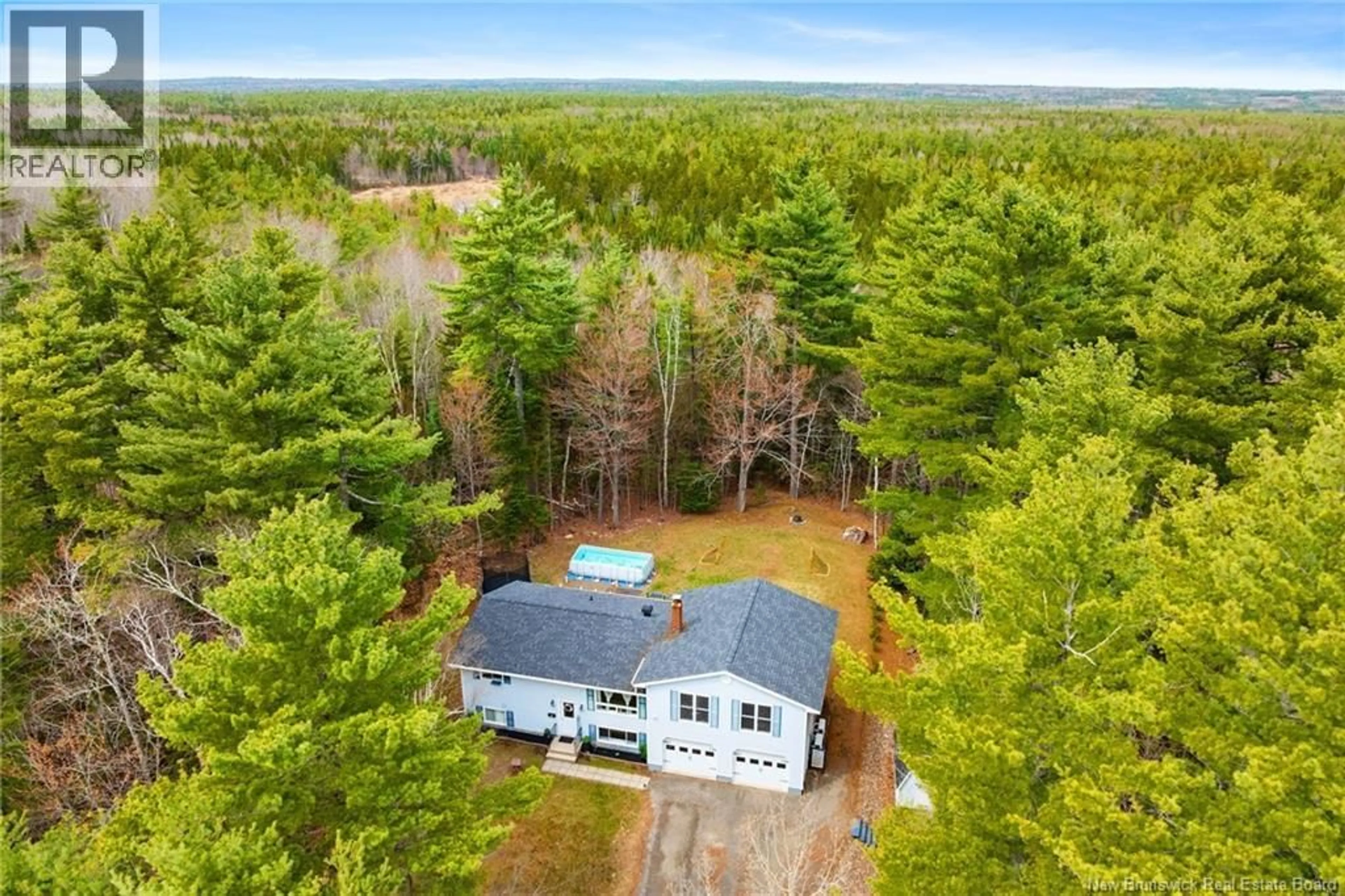 A pic from outside/outdoor area/front of a property/back of a property/a pic from drone, forest/trees view for 152 RAINBOW DRIVE, Charters Settlement New Brunswick E3C1V1