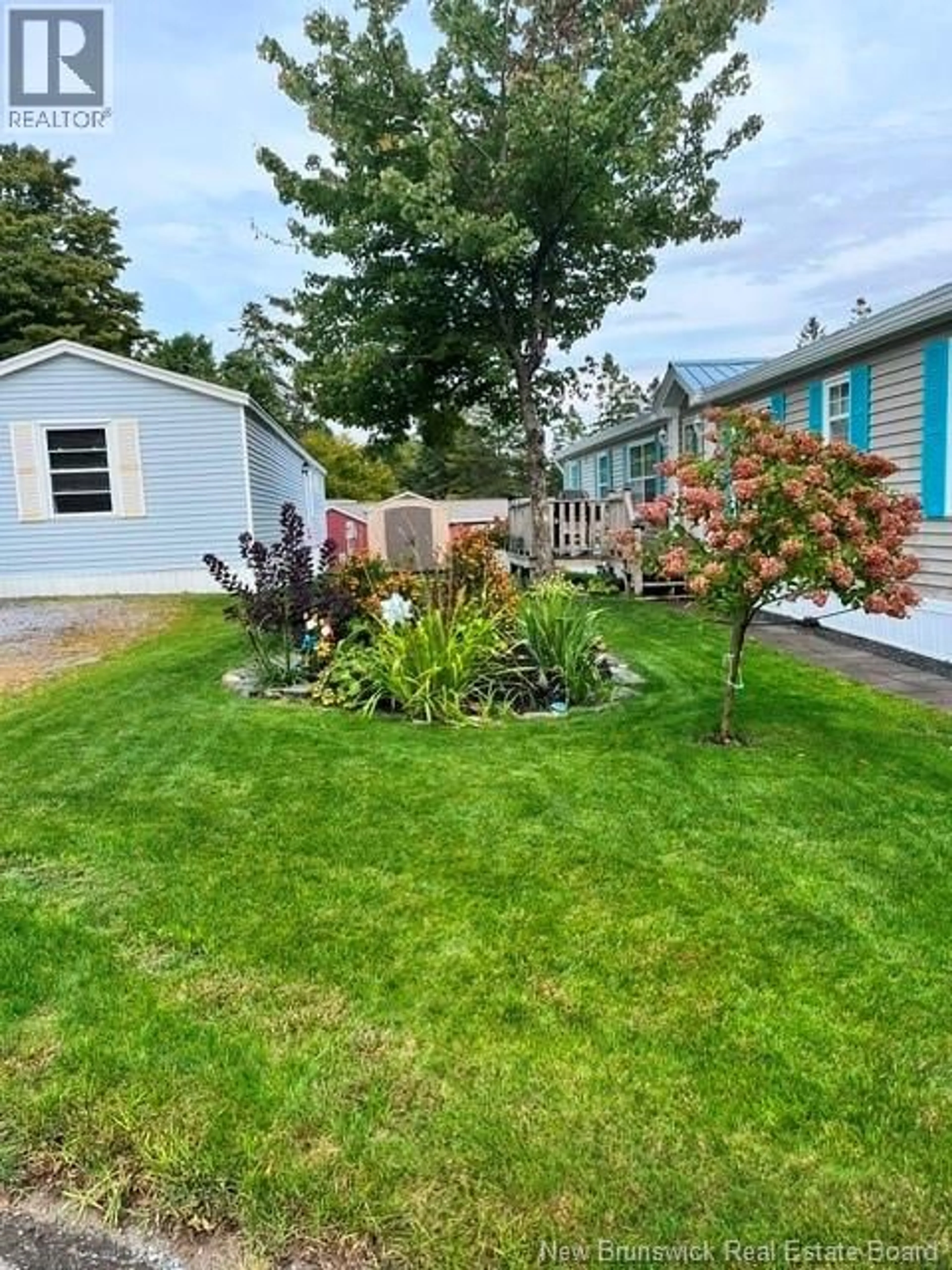 A pic from outside/outdoor area/front of a property/back of a property/a pic from drone, water/lake/river/ocean view for 11 SITKA LANE, Quispamsis New Brunswick E2G1W9