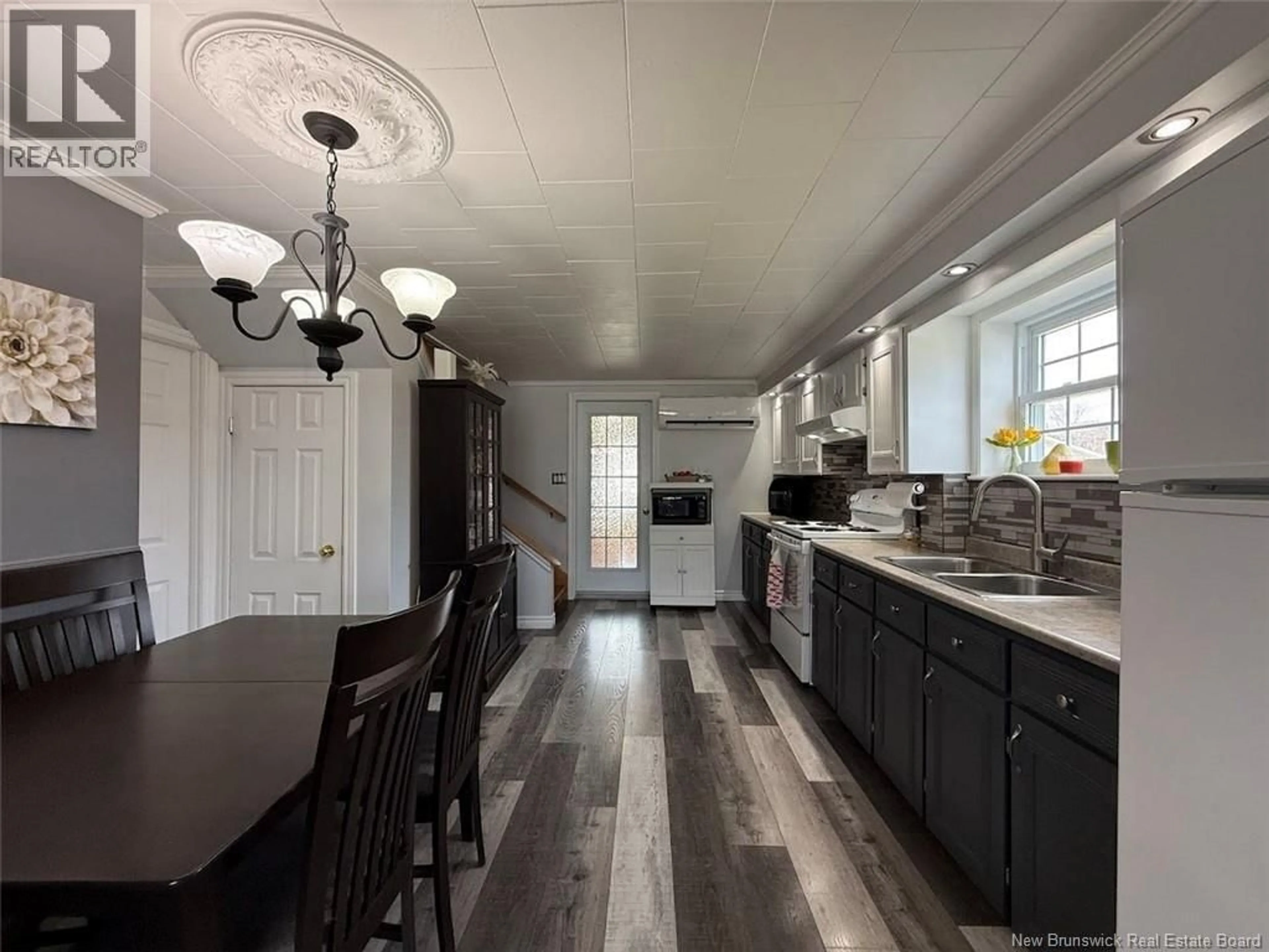 Open concept kitchen, ceramic/tile floor for 18 DES ERABLES AVENUE, Clair New Brunswick E7A2B5