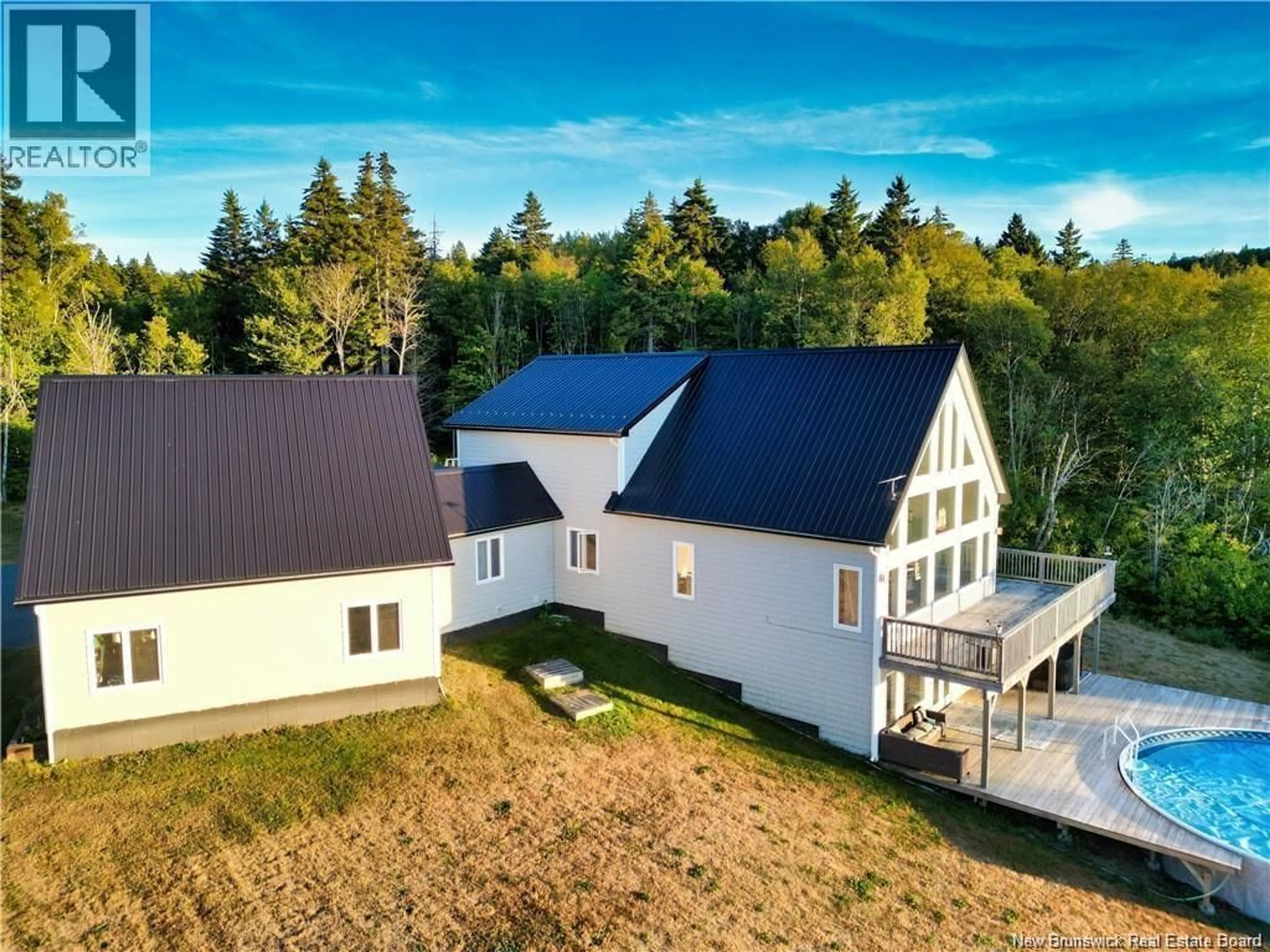 A pic from outside/outdoor area/front of a property/back of a property/a pic from drone, unknown for 233 BUNKER HILL ROAD, Wilsons Beach New Brunswick E5E1M3