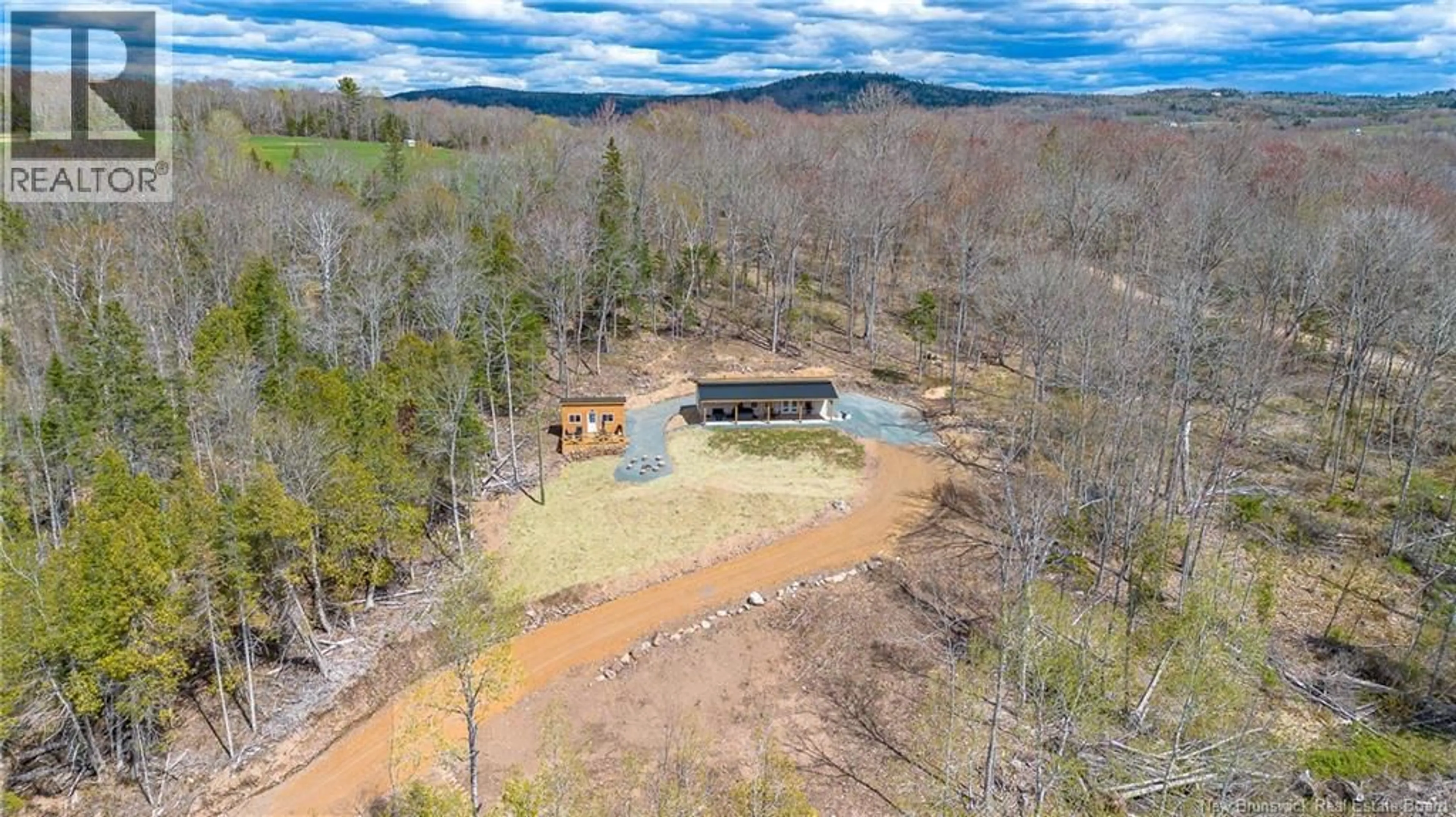 A pic from outside/outdoor area/front of a property/back of a property/a pic from drone, water/lake/river/ocean view for 97 BROWNS COVE ROAD, Kars New Brunswick E5T2Z5
