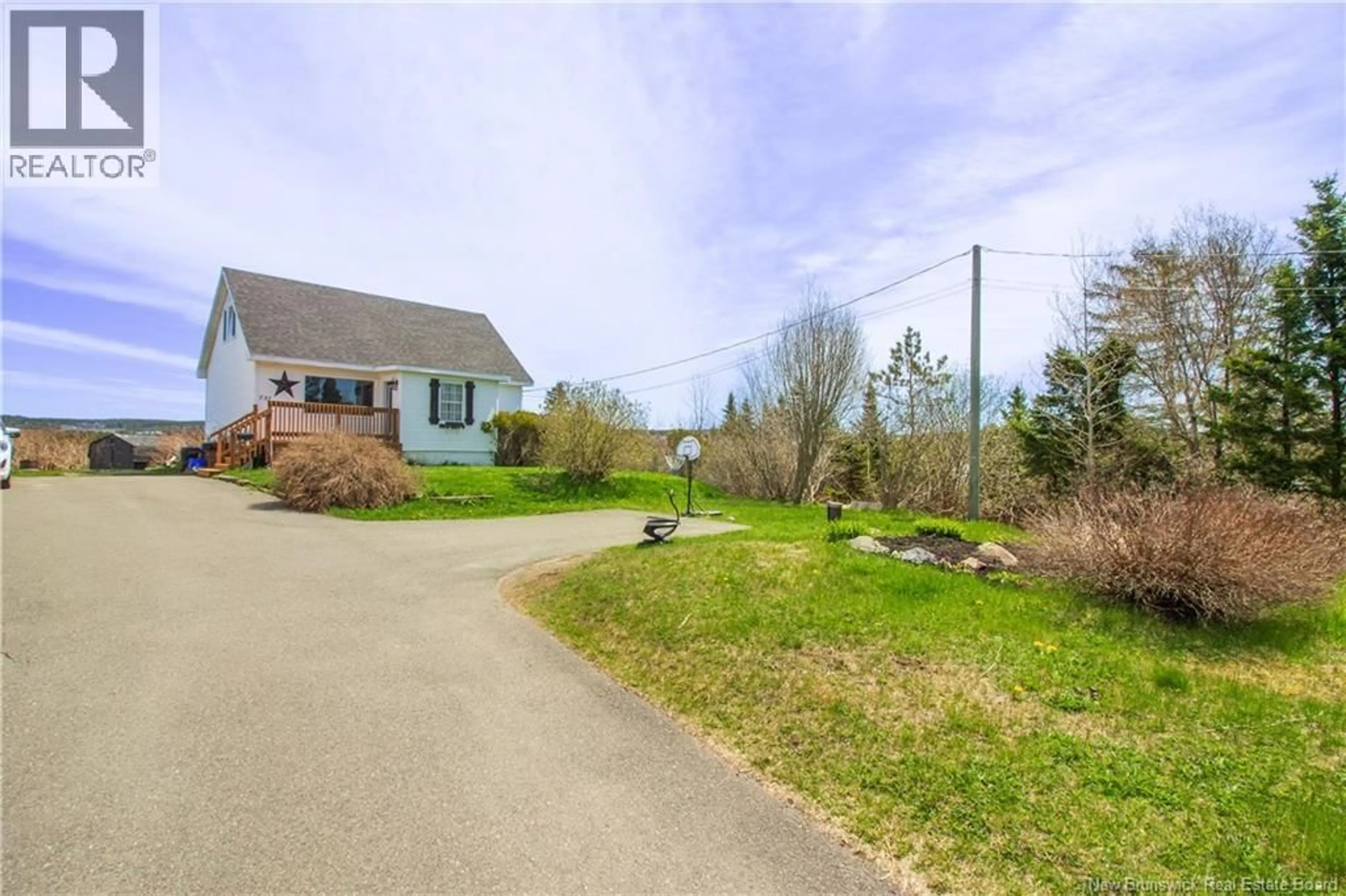 A pic from outside/outdoor area/front of a property/back of a property/a pic from drone, street for 731 RED HEAD ROAD, Saint John New Brunswick E2P1J3