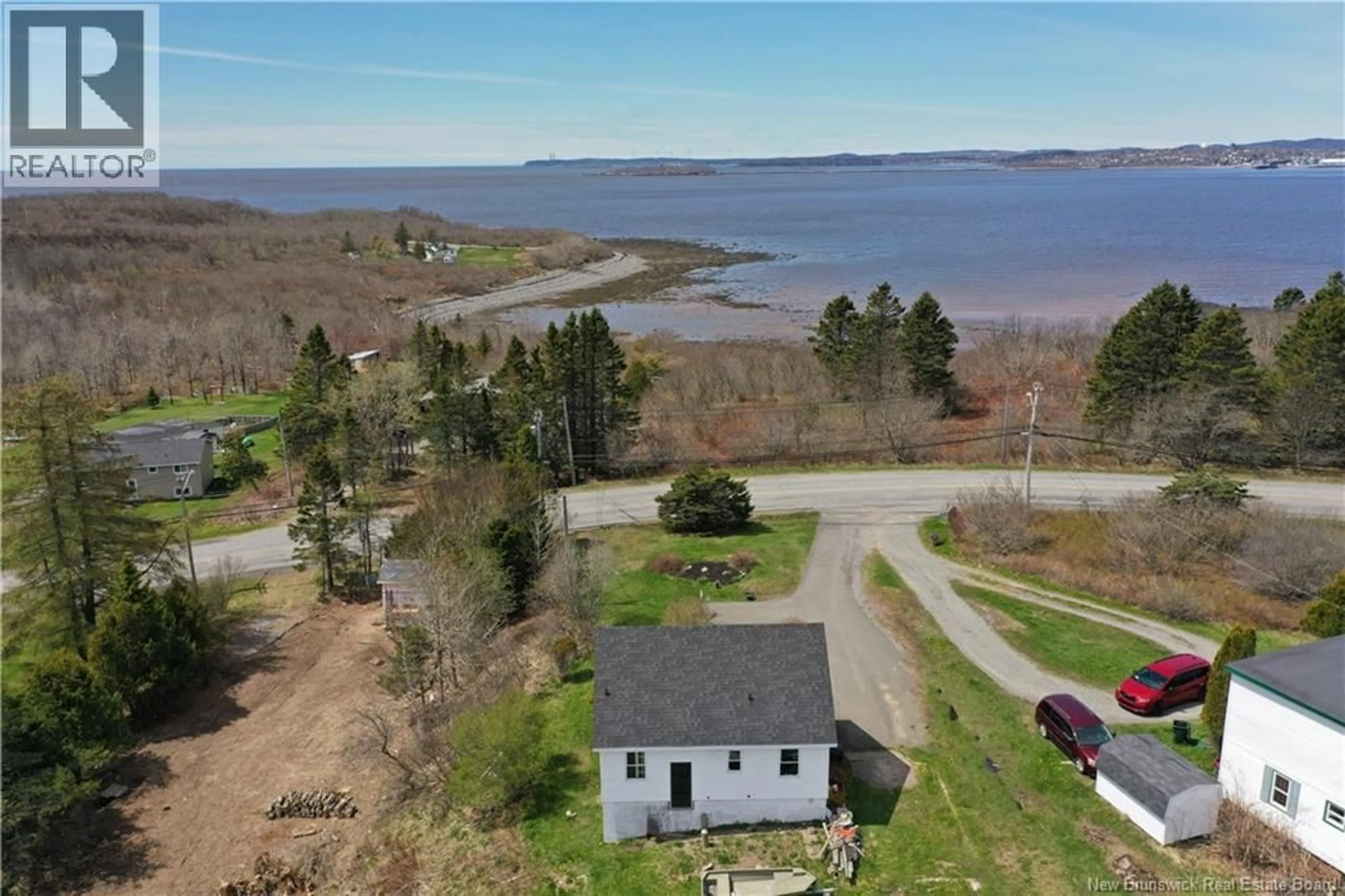 A pic from outside/outdoor area/front of a property/back of a property/a pic from drone, water/lake/river/ocean view for 731 RED HEAD ROAD, Saint John New Brunswick E2P1J3