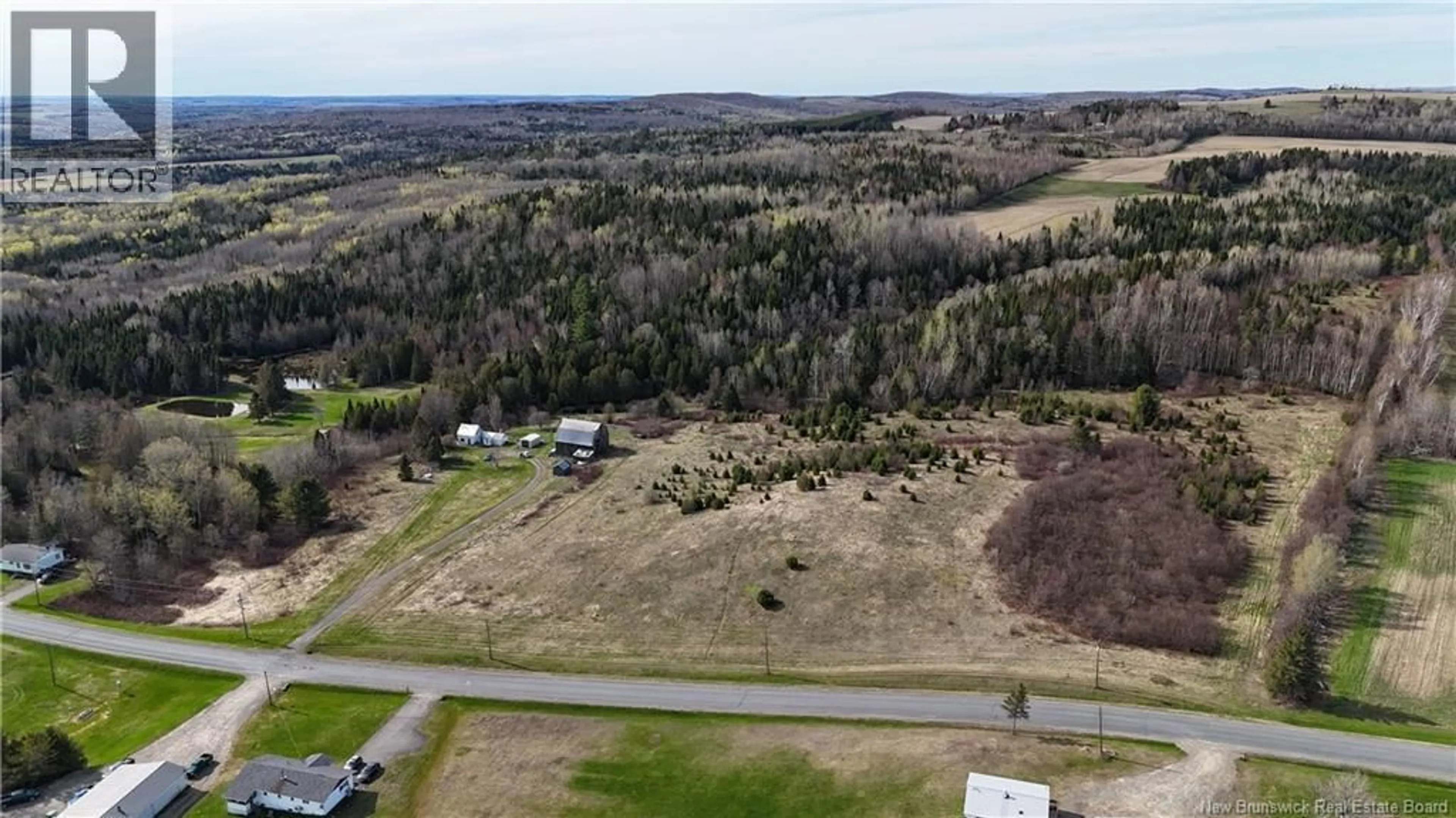 A pic from outside/outdoor area/front of a property/back of a property/a pic from drone, forest/trees view for 219 CHURCHLAND ROAD, Tilley New Brunswick E7H1S7