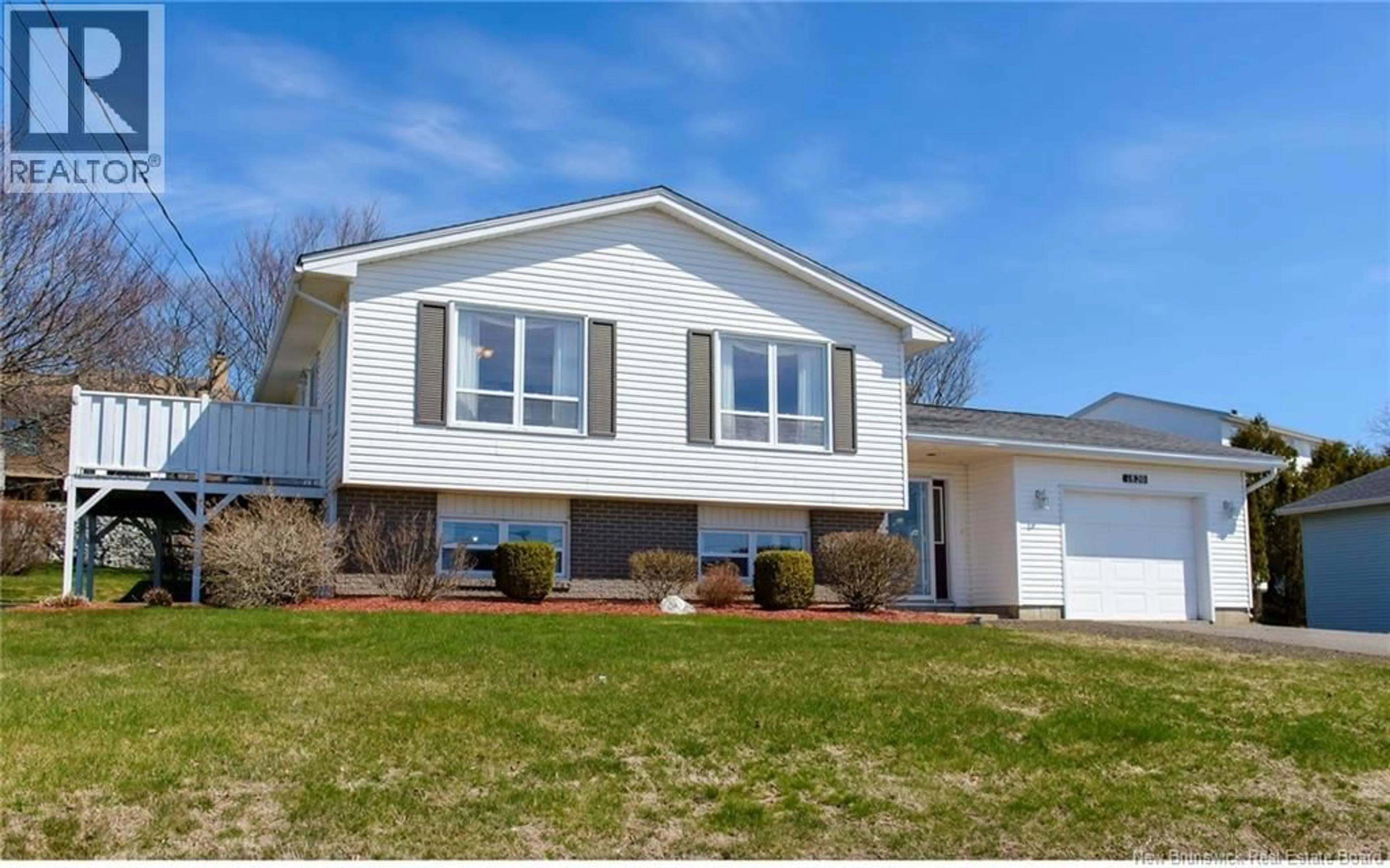 Home with vinyl exterior material, street for 1820 MANAWAGONISH ROAD, Saint John New Brunswick E2M3Y5