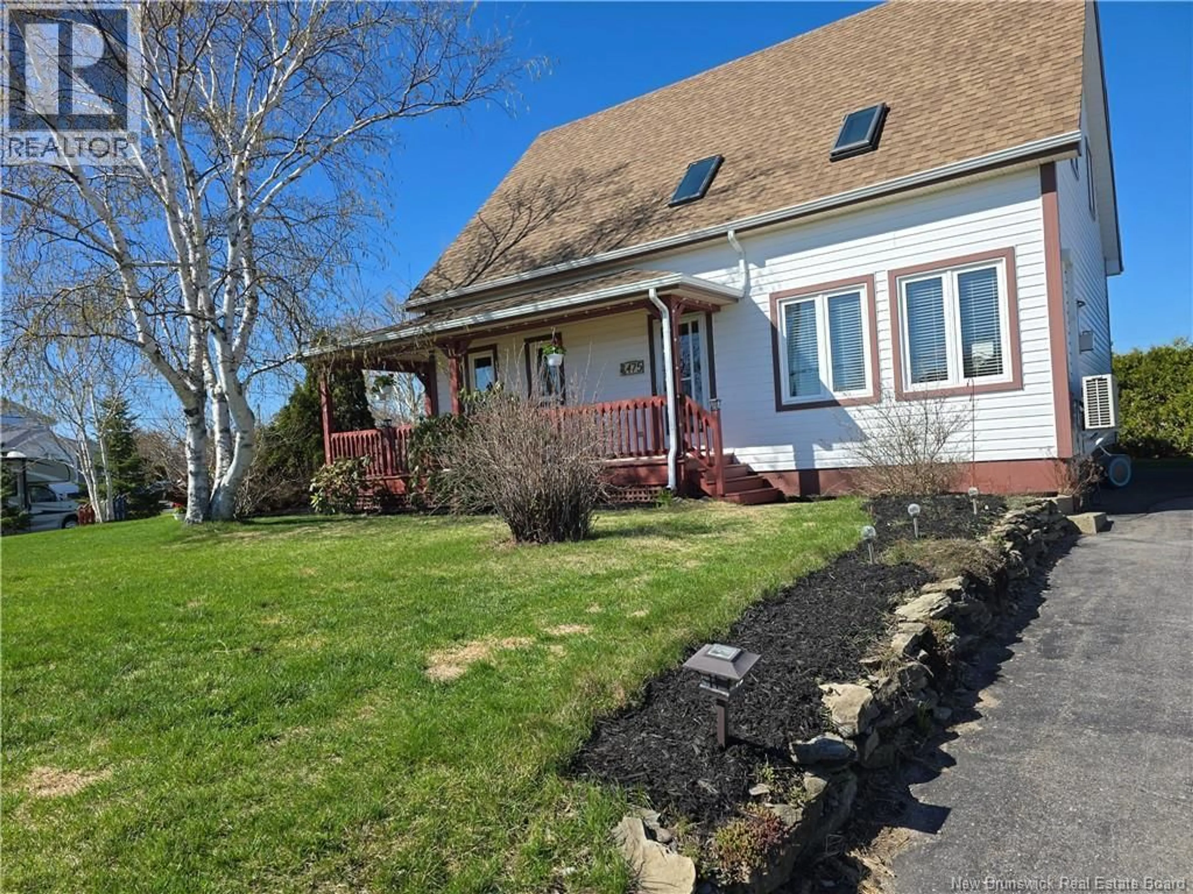 A pic from outside/outdoor area/front of a property/back of a property/a pic from drone, street for 475 MGR RICHARD, Beresford New Brunswick E8K1Z1
