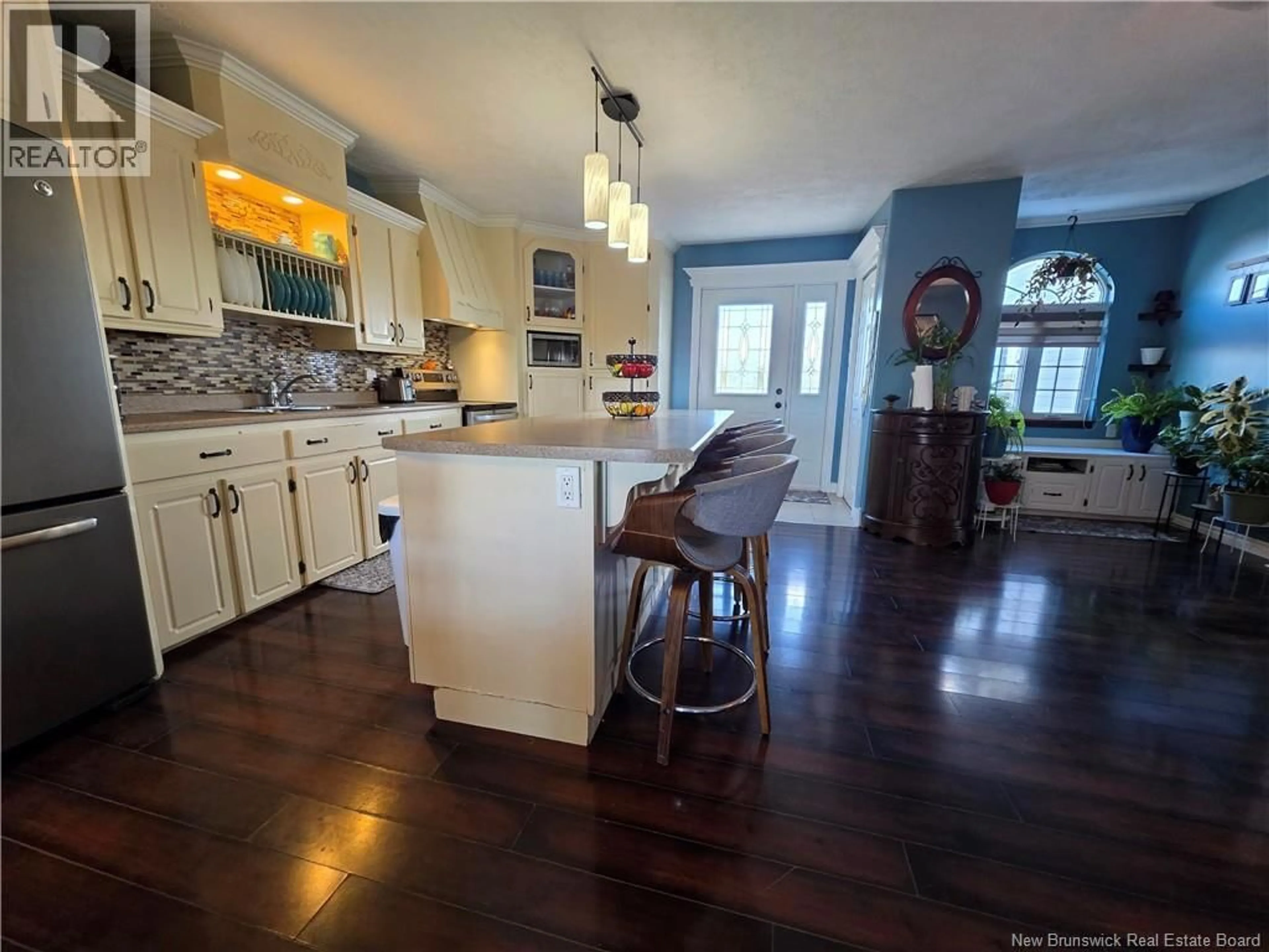 Open concept kitchen, wood/laminate floor for 225 1ER RANG ROAD, DSL de Drummond/DSL of Drummond New Brunswick E3Y2S6