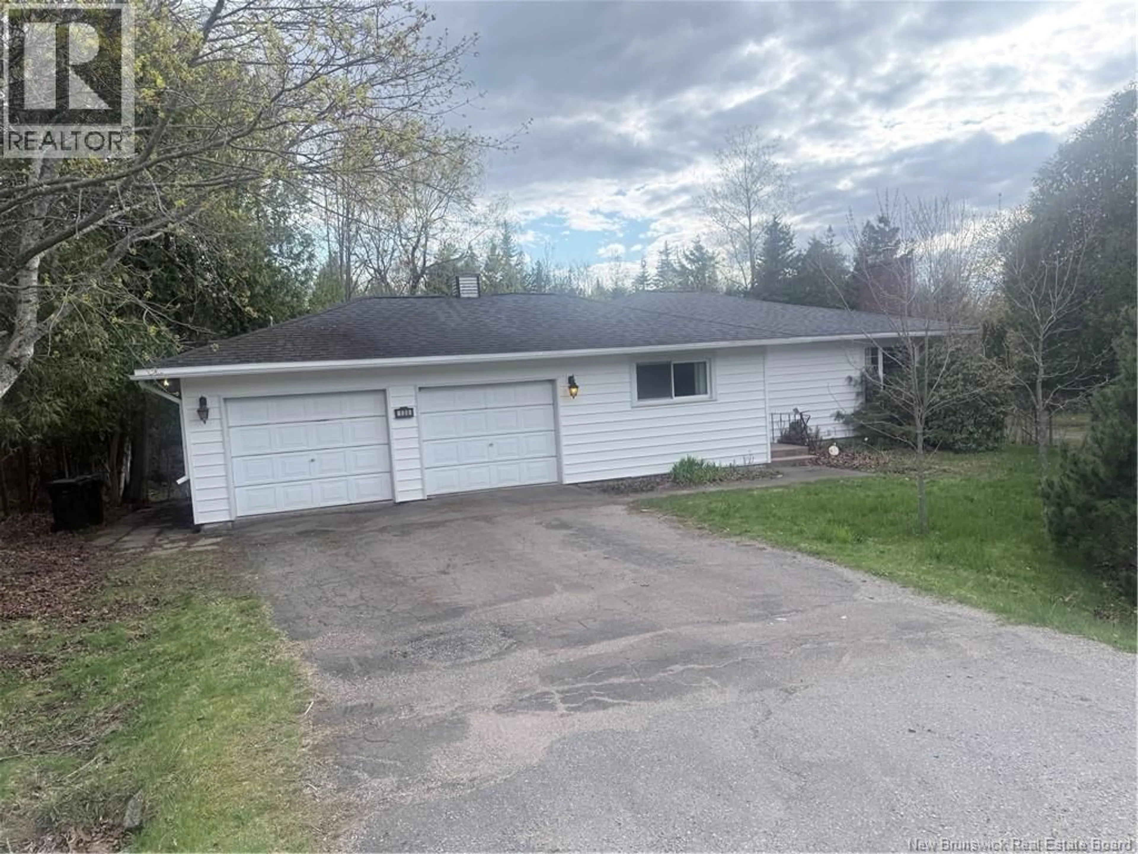 A pic from outside/outdoor area/front of a property/back of a property/a pic from drone, street for 130 RENSHAW ROAD, Rothesay New Brunswick E2H1R6