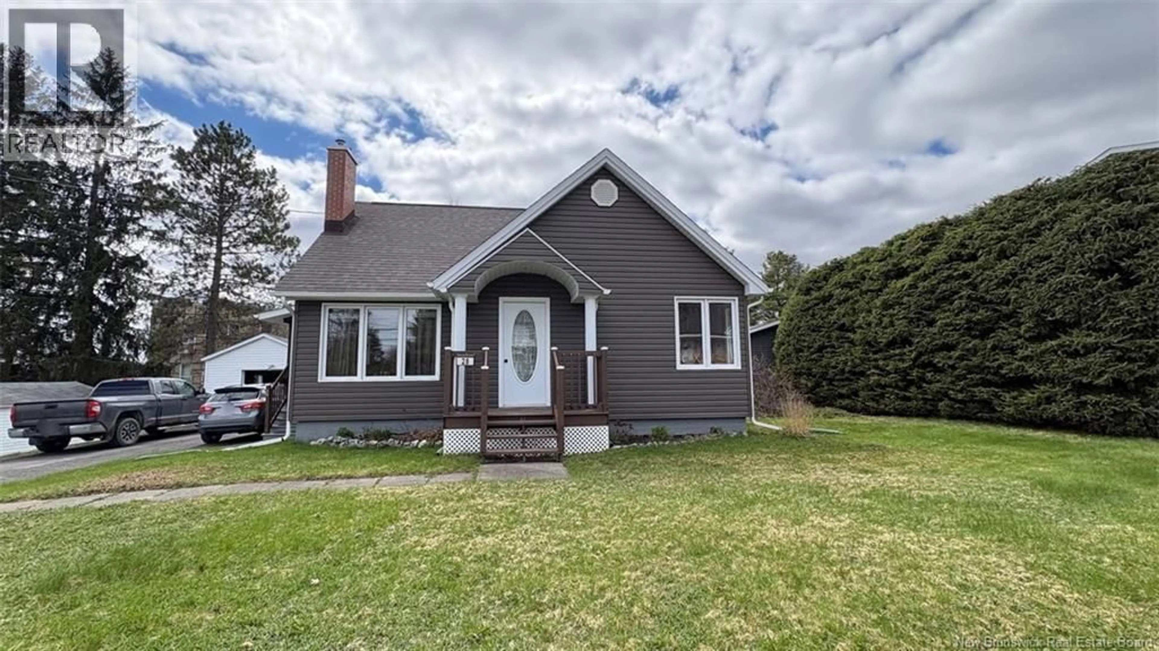 Home with vinyl exterior material, street for 28 PHILIPPE AVENUE, Edmundston New Brunswick E3V1R1