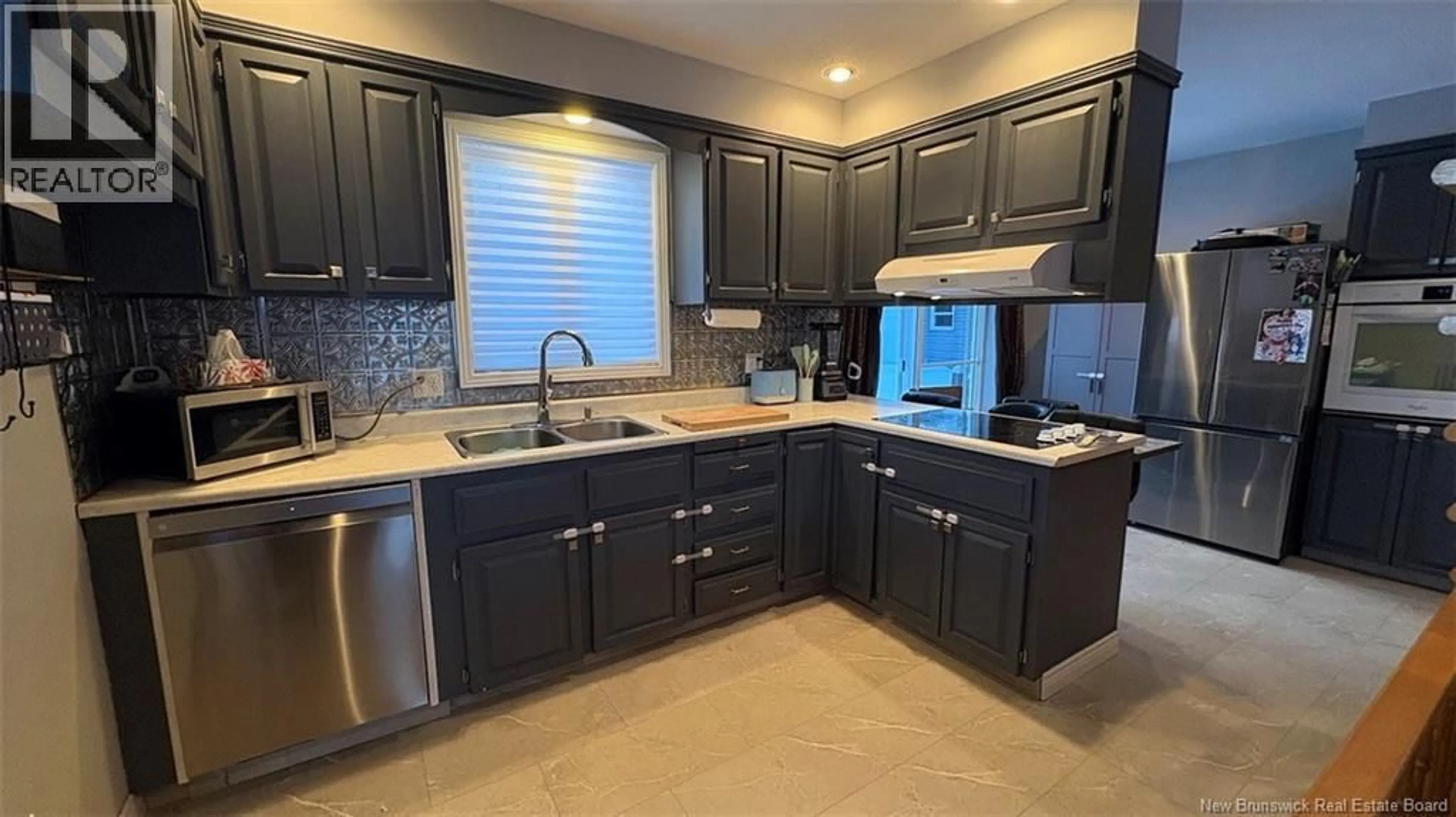 Standard kitchen, ceramic/tile floor for 28 PHILIPPE AVENUE, Edmundston New Brunswick E3V1R1