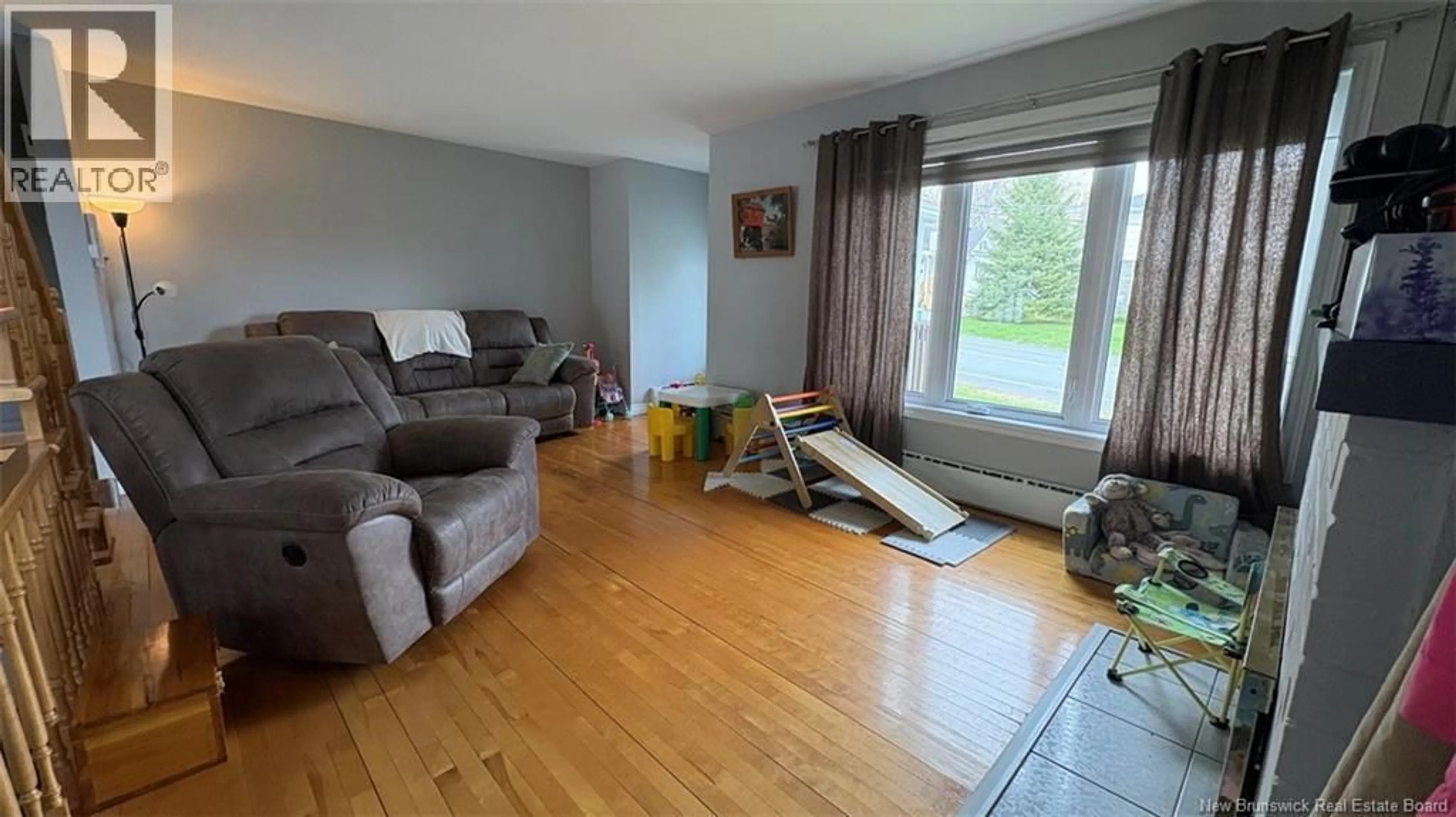 Living room with furniture, unknown for 28 PHILIPPE AVENUE, Edmundston New Brunswick E3V1R1