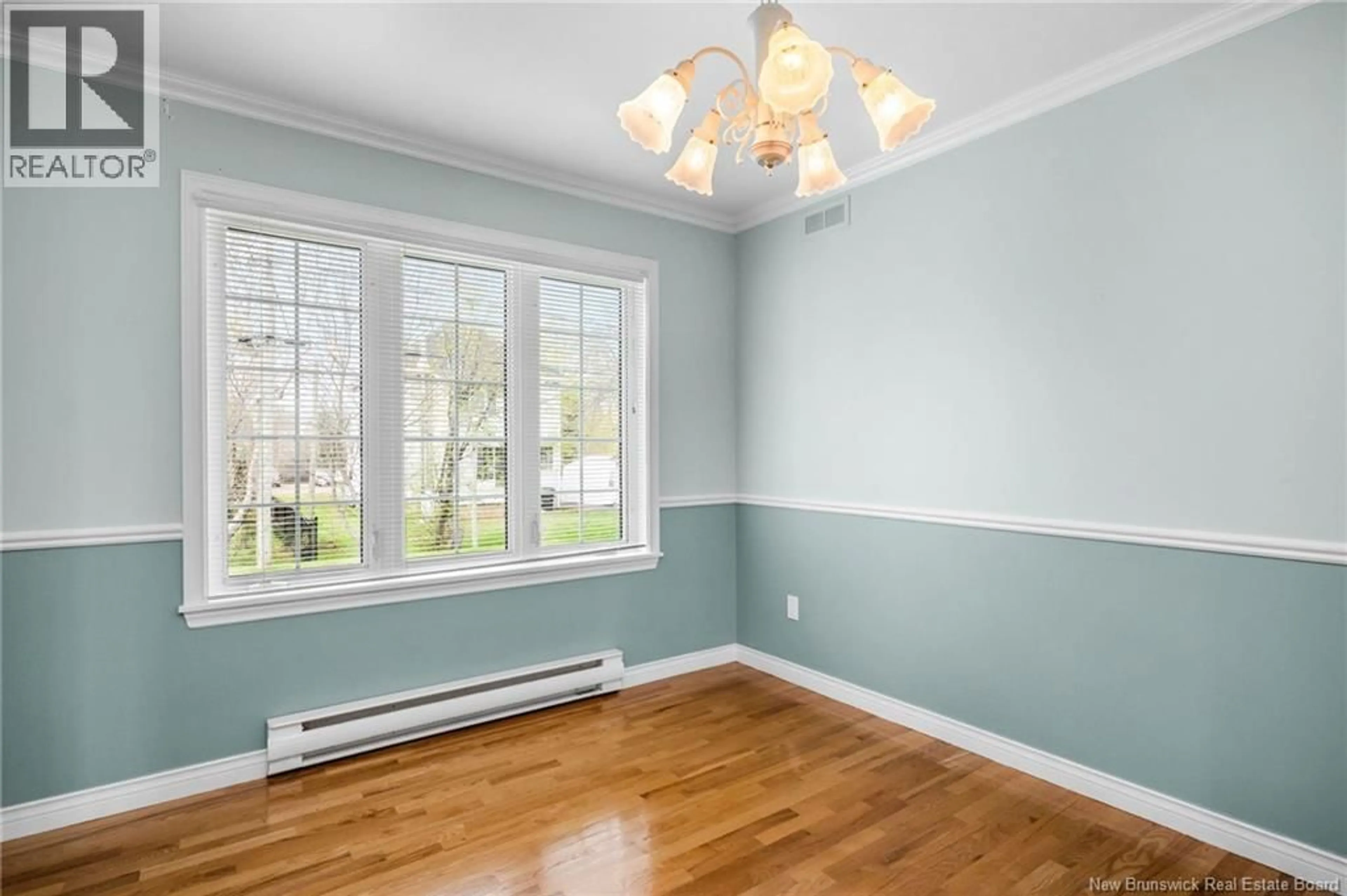 Dining room, wood/laminate floor for 215 OLIVE STREET, Shediac New Brunswick E4P2K2
