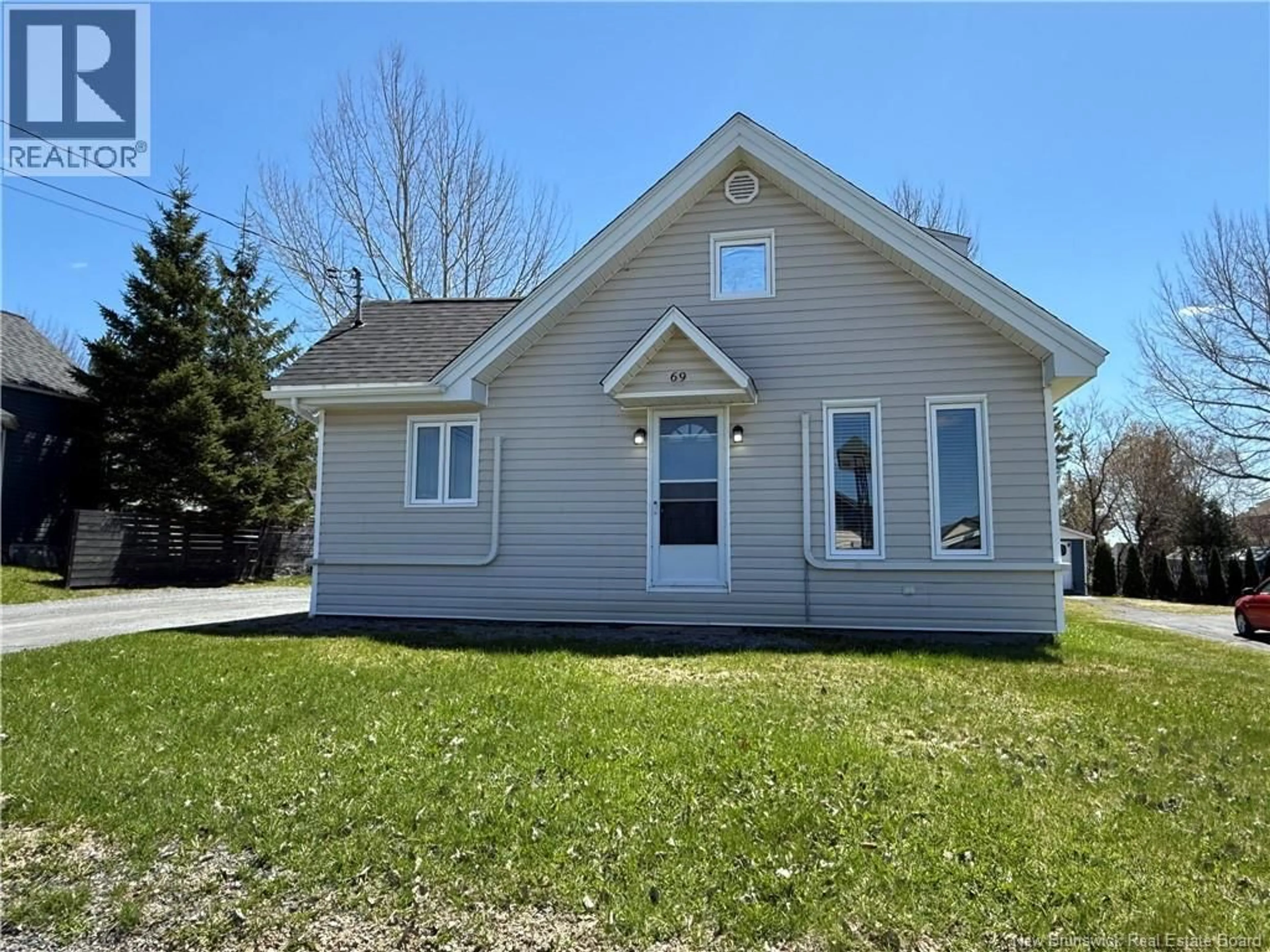 Home with vinyl exterior material, street for 69 PONT ROAD, Saint-Léonard New Brunswick E7E1Y4