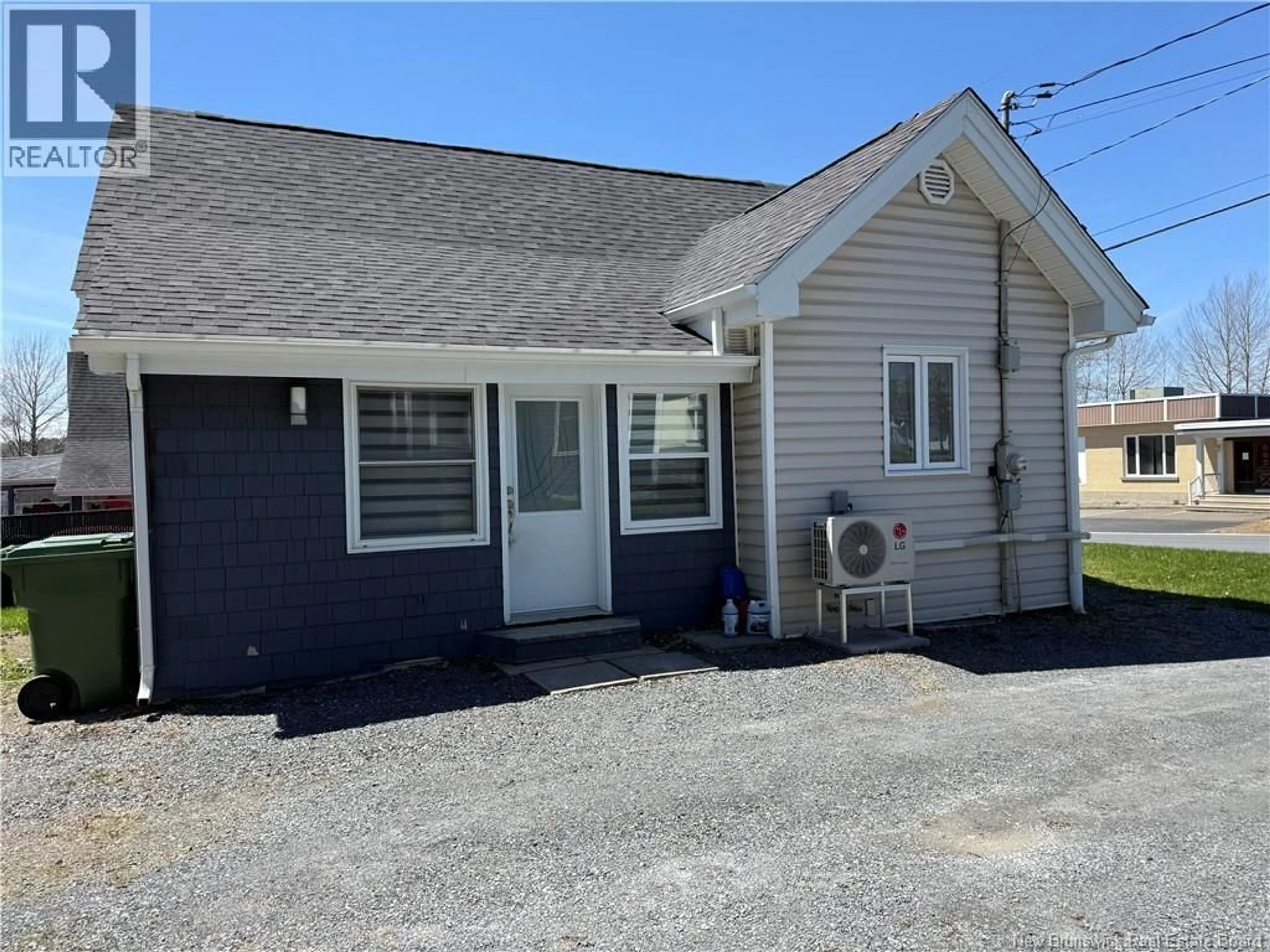 Home with vinyl exterior material, street for 69 PONT ROAD, Saint-Léonard New Brunswick E7E1Y4