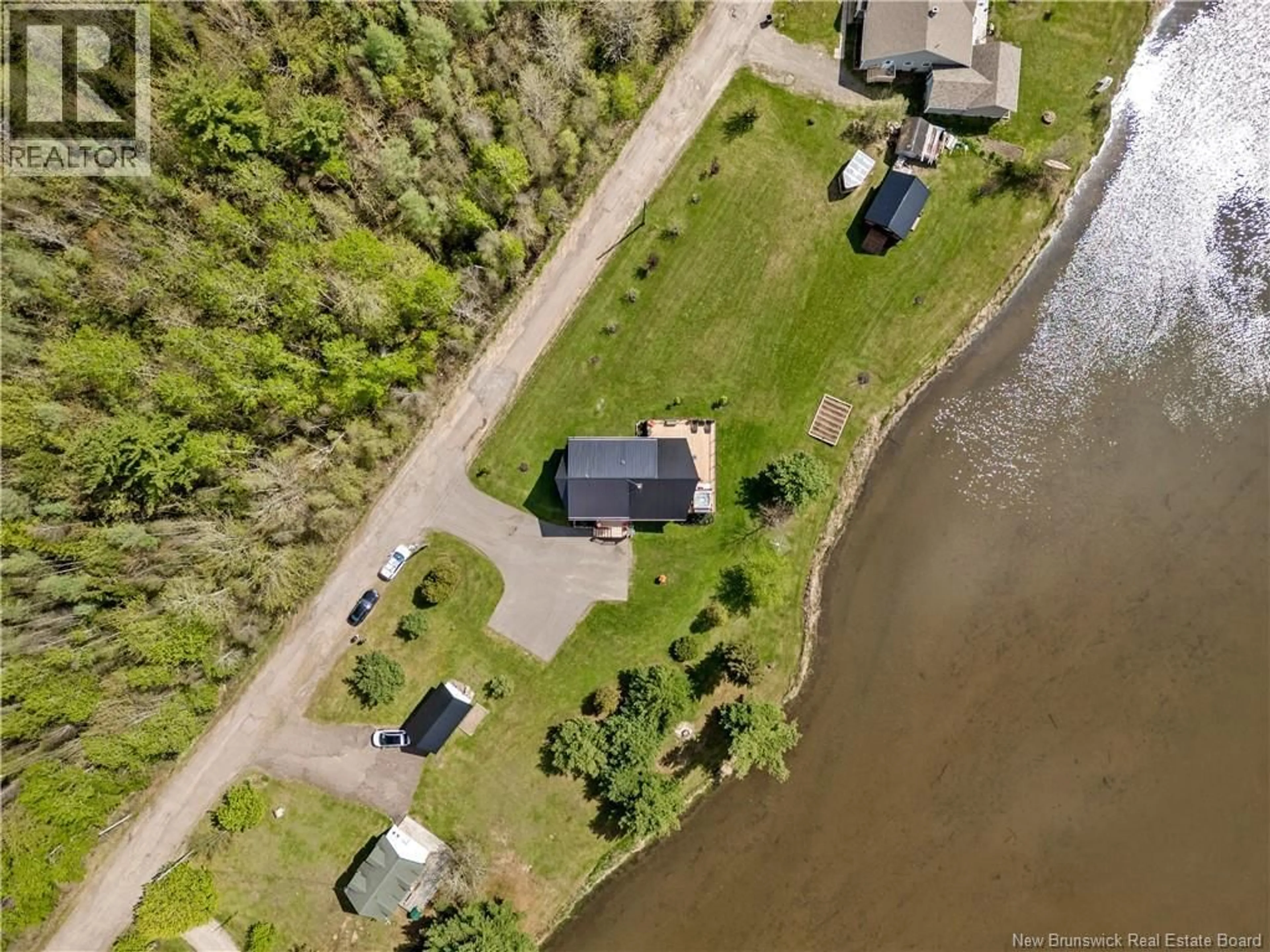 A pic from outside/outdoor area/front of a property/back of a property/a pic from drone, water/lake/river/ocean view for 31 CLEAR VIEW ROAD, Grand-Barachois New Brunswick E4P6Z1