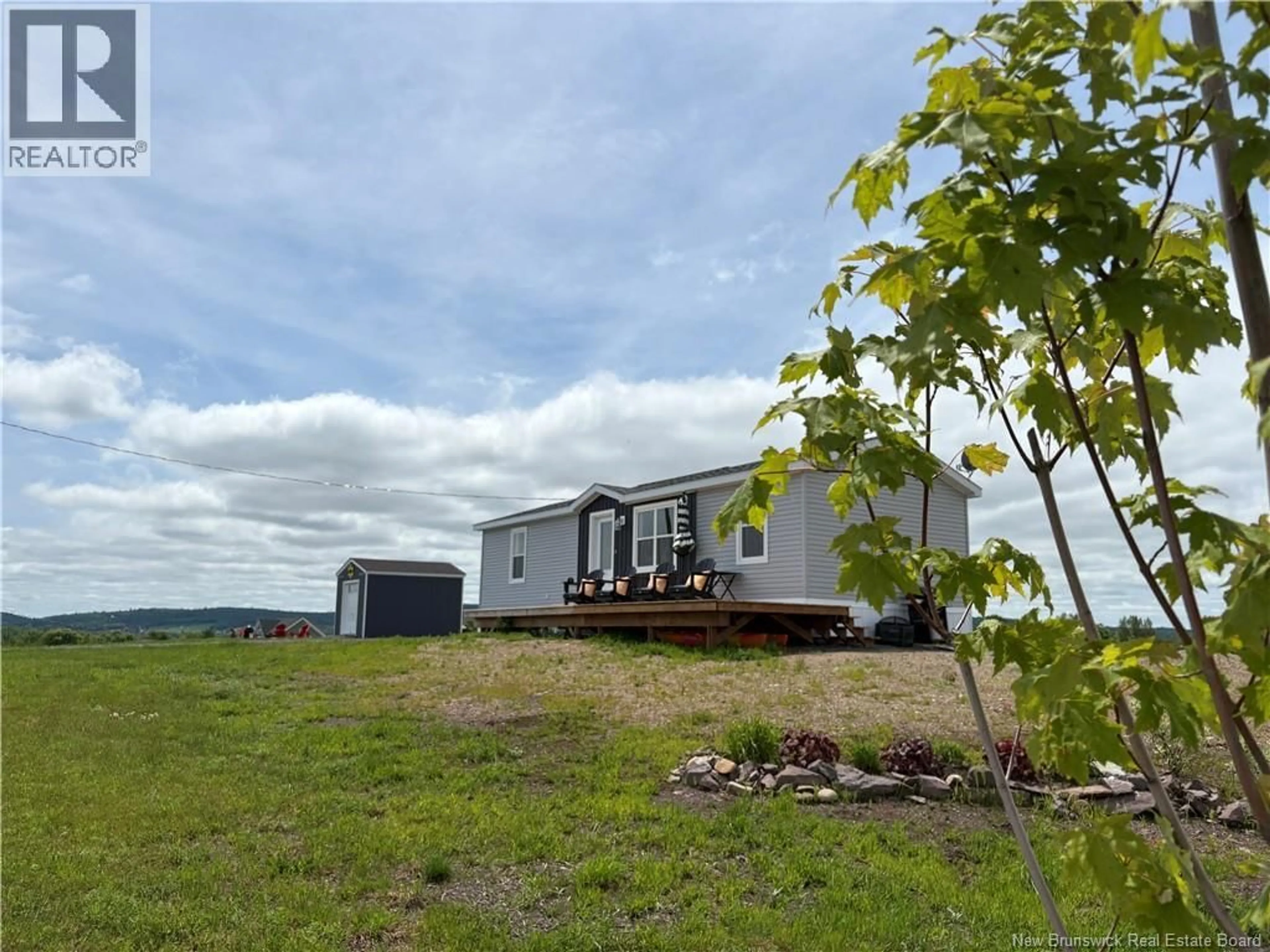 A pic from outside/outdoor area/front of a property/back of a property/a pic from drone, mountain view for 147 OTNABOG LANE, Upper Hampstead New Brunswick E5M0C9