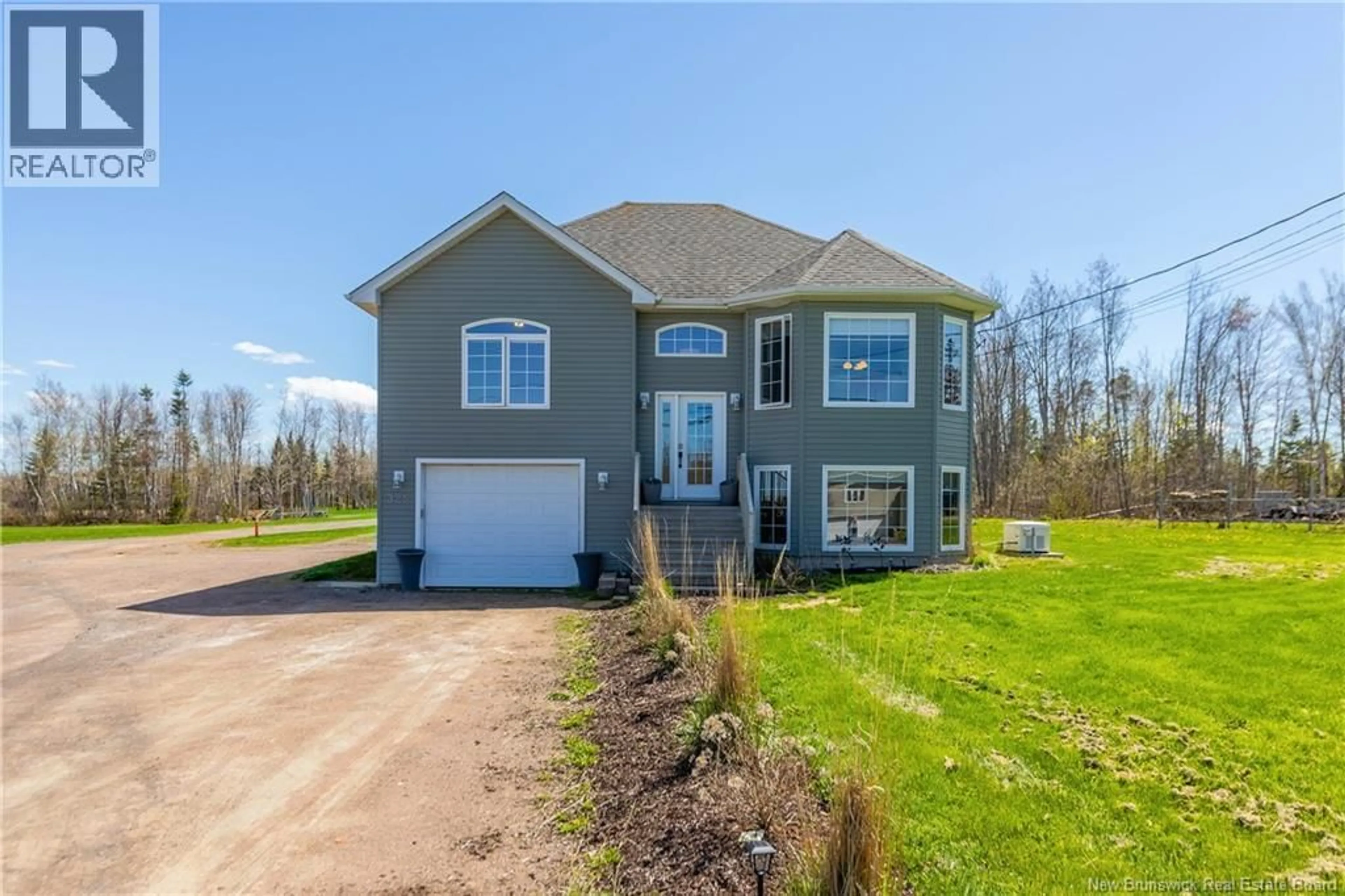 Home with vinyl exterior material, street for 325 TROIS RUISSEAUX, Trois Ruisseaux New Brunswick E4N3A4