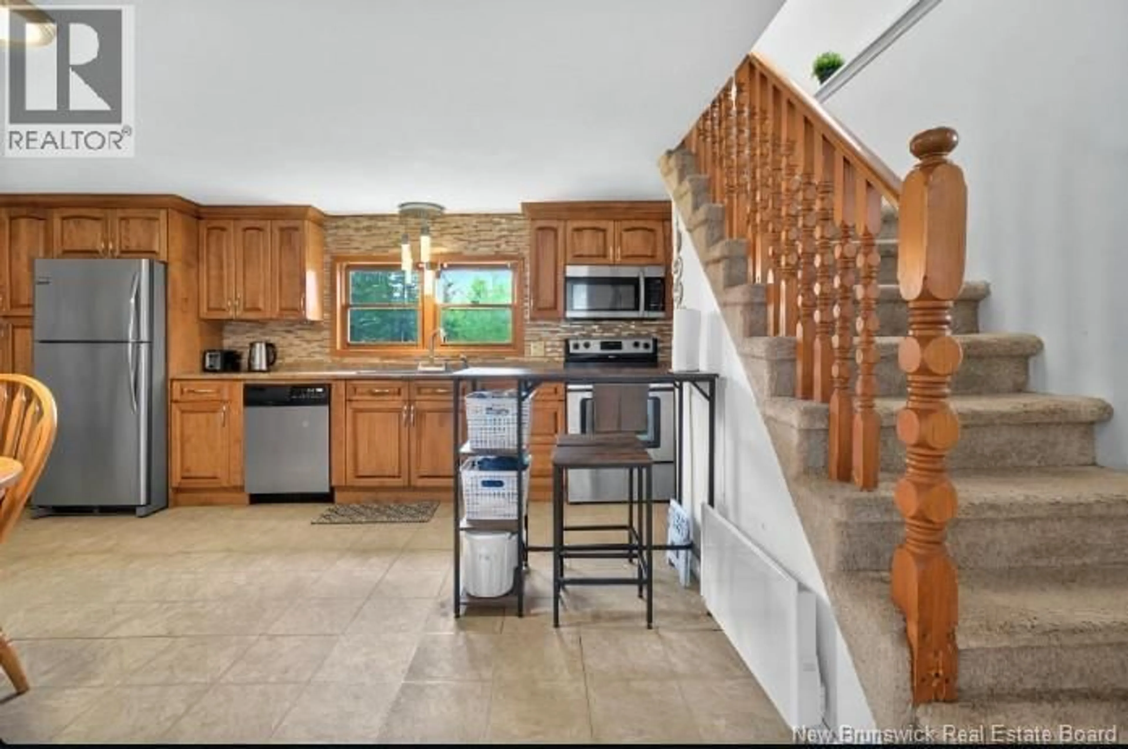 Open concept kitchen, ceramic/tile floor for 745 AMIRAULT STREET, Dieppe New Brunswick E1A1E9
