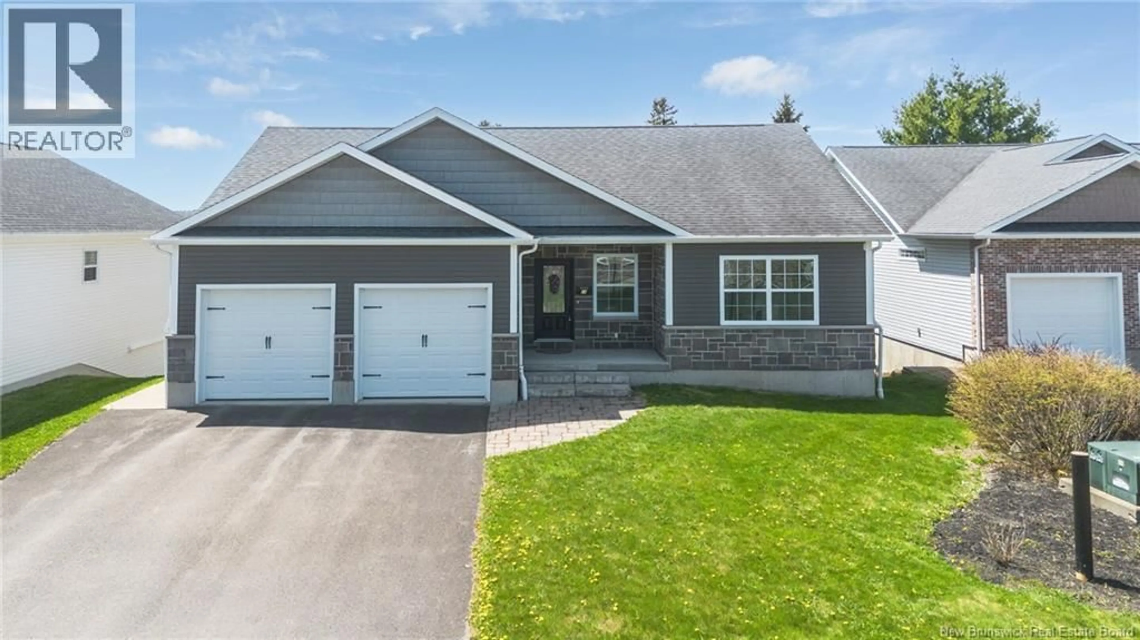 Home with vinyl exterior material, street for 18 BRIAR BROOK PLACE, Fredericton New Brunswick E3A3N1