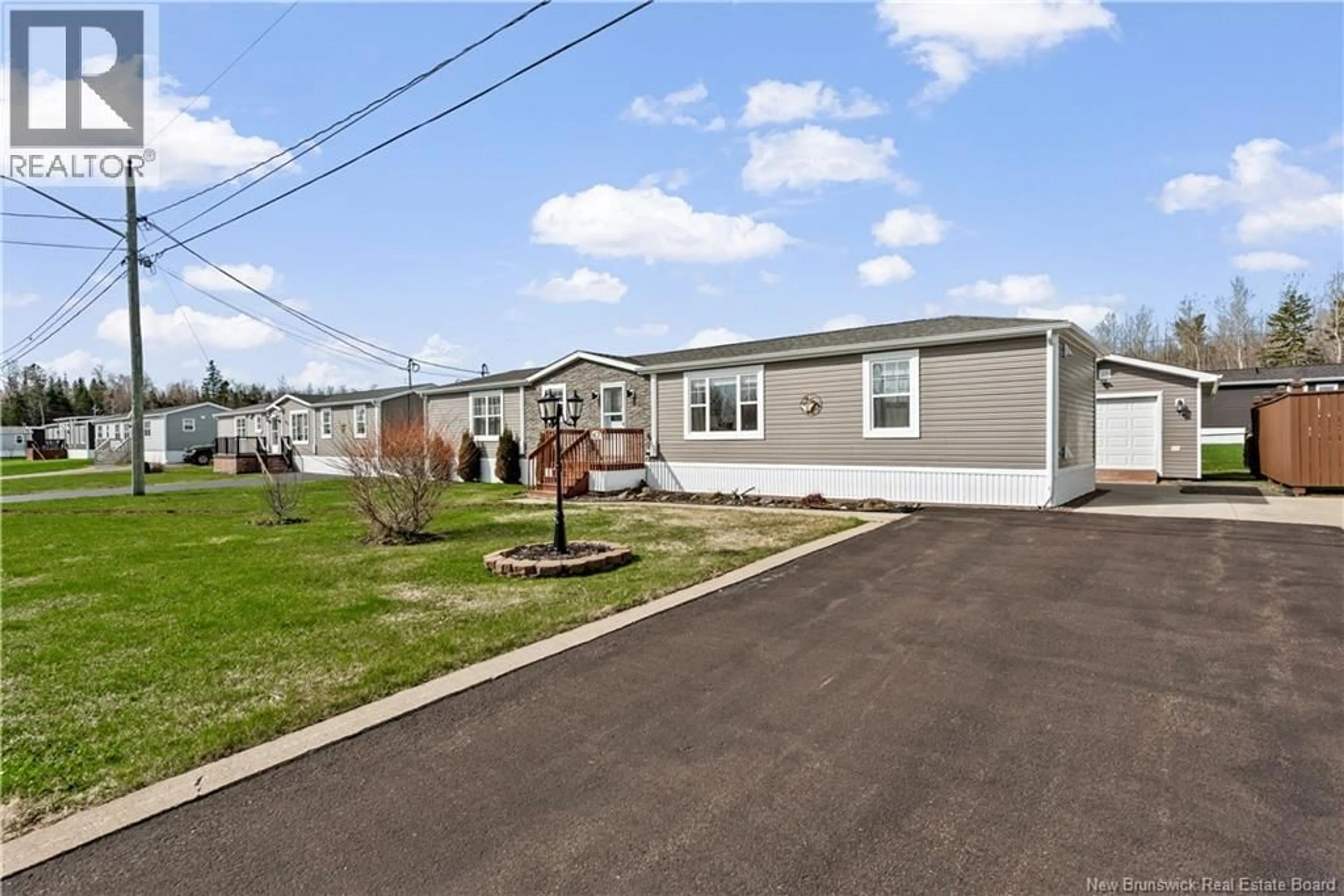 Home with vinyl exterior material, street for 267 BONAVENTURE, Shediac New Brunswick E4P0G7