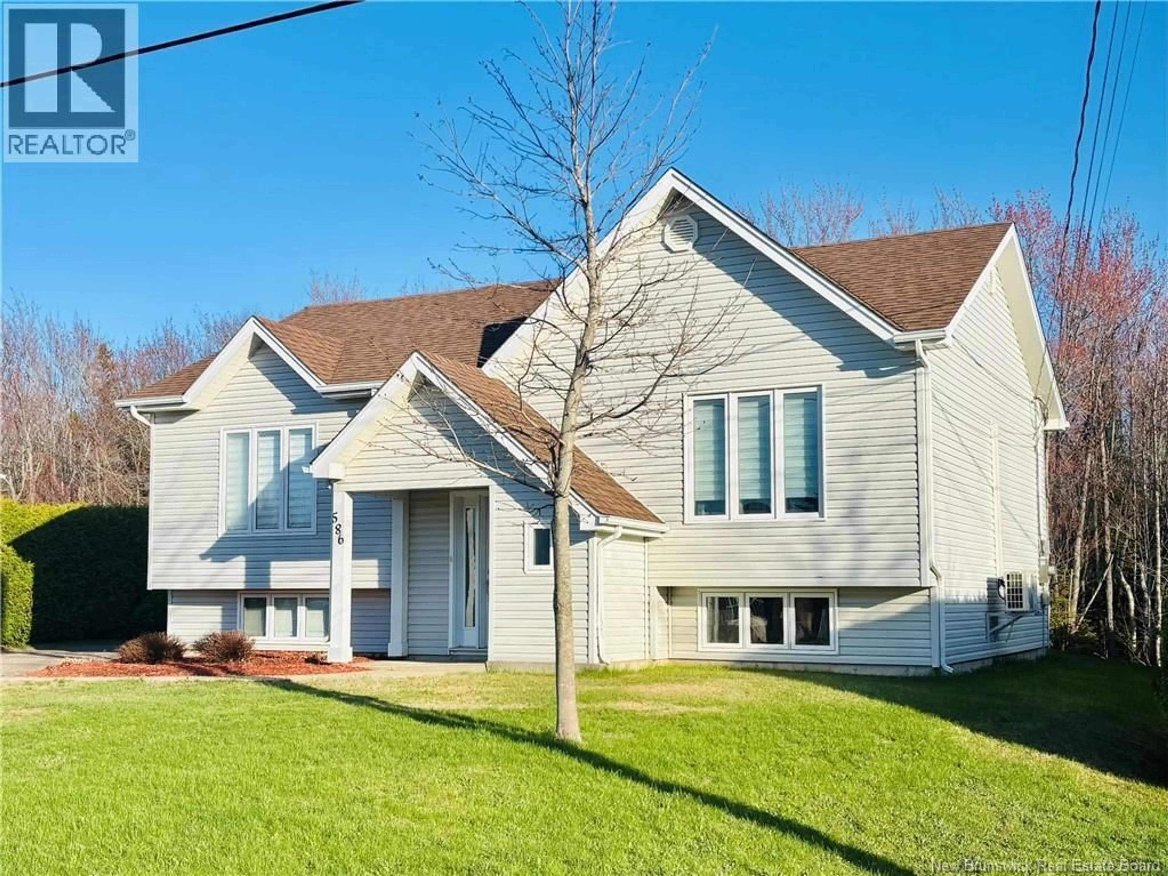 Home with brick exterior material, street for 586 RUE BREAU, Tracadie New Brunswick E1X1B5
