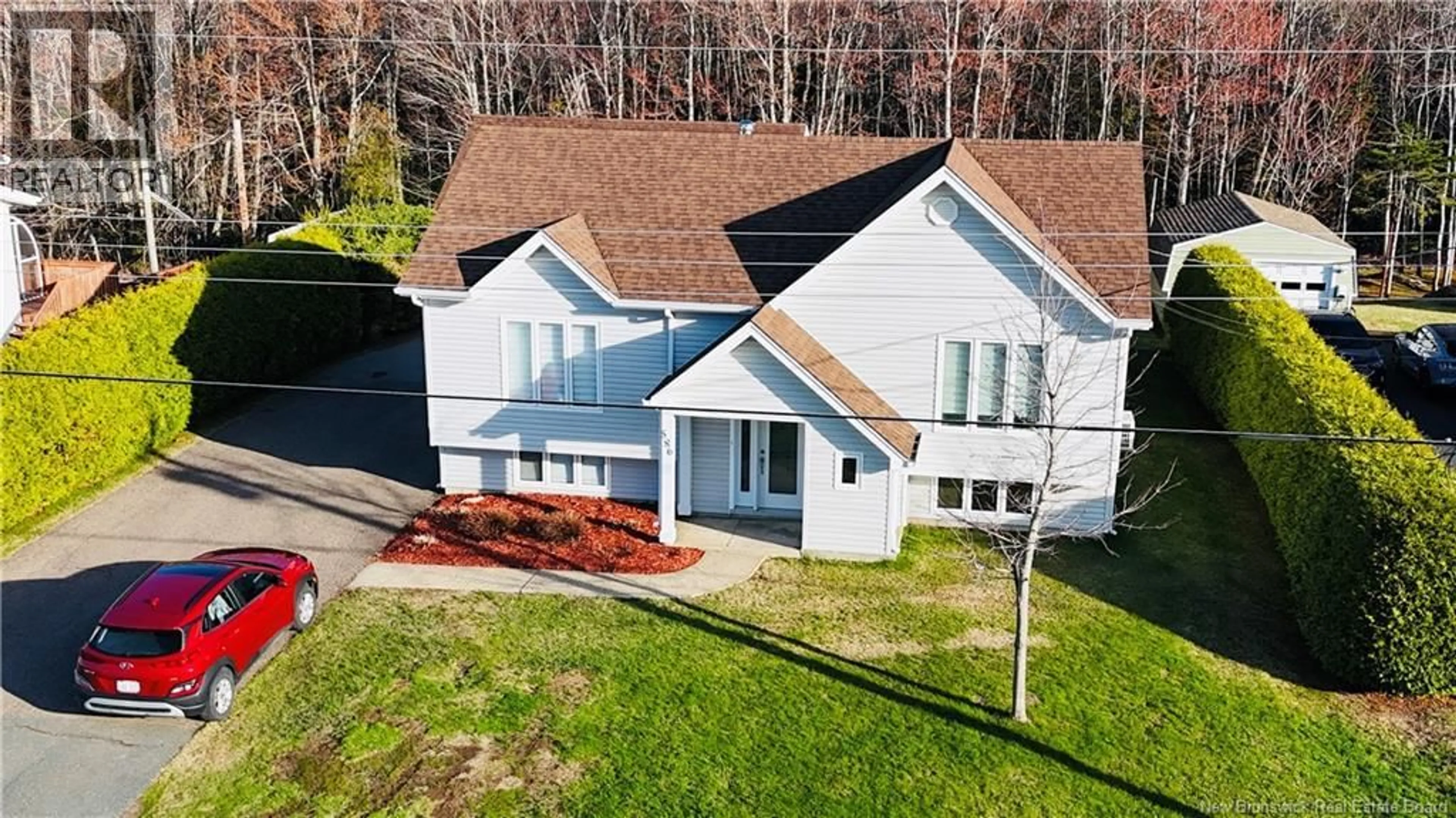 A pic from outside/outdoor area/front of a property/back of a property/a pic from drone, unknown for 586 RUE BREAU, Tracadie New Brunswick E1X1B5