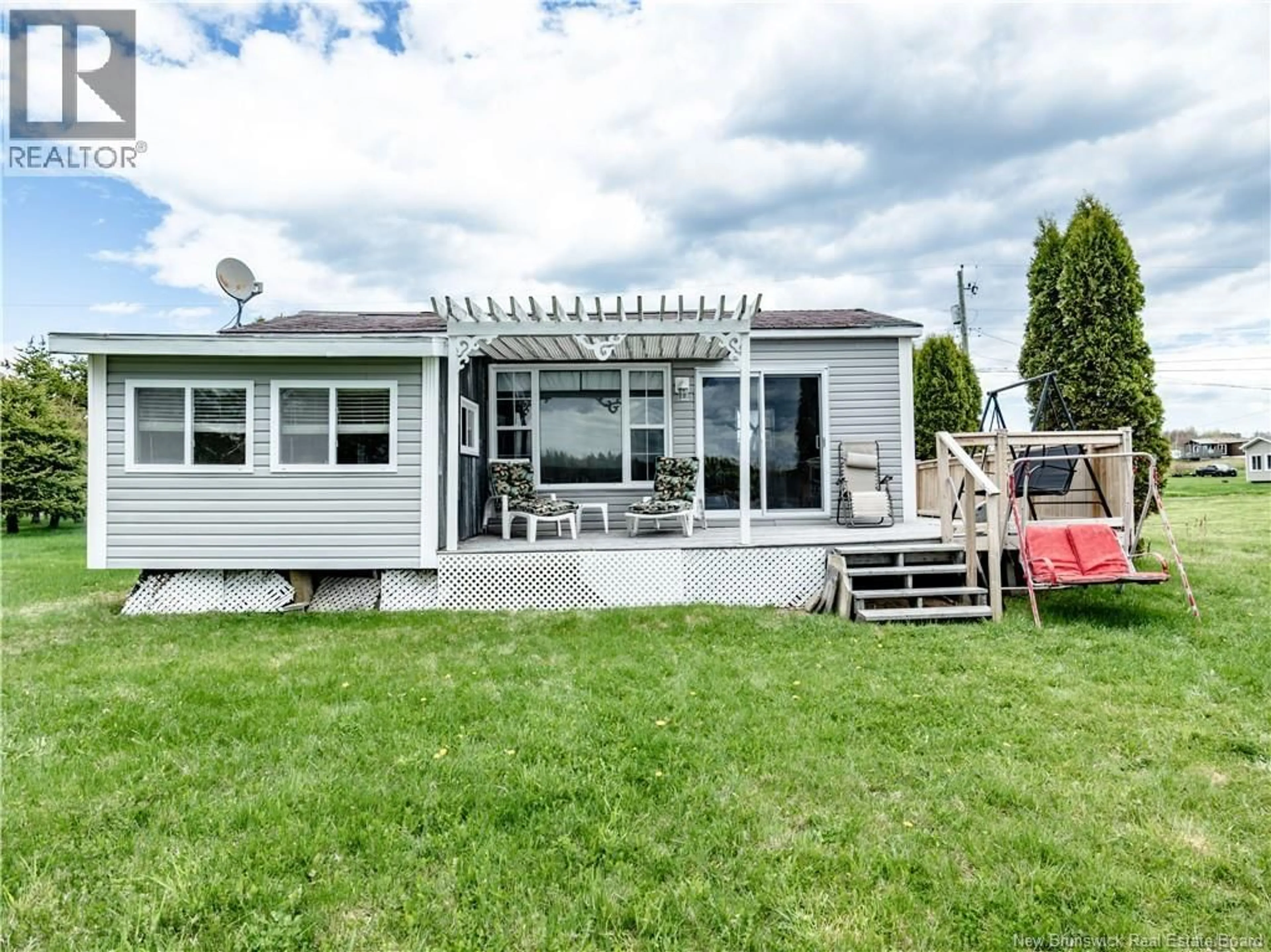 A pic from outside/outdoor area/front of a property/back of a property/a pic from drone, water/lake/river/ocean view for 49 ROBERT LANE, Bouctouche New Brunswick E4S5M7