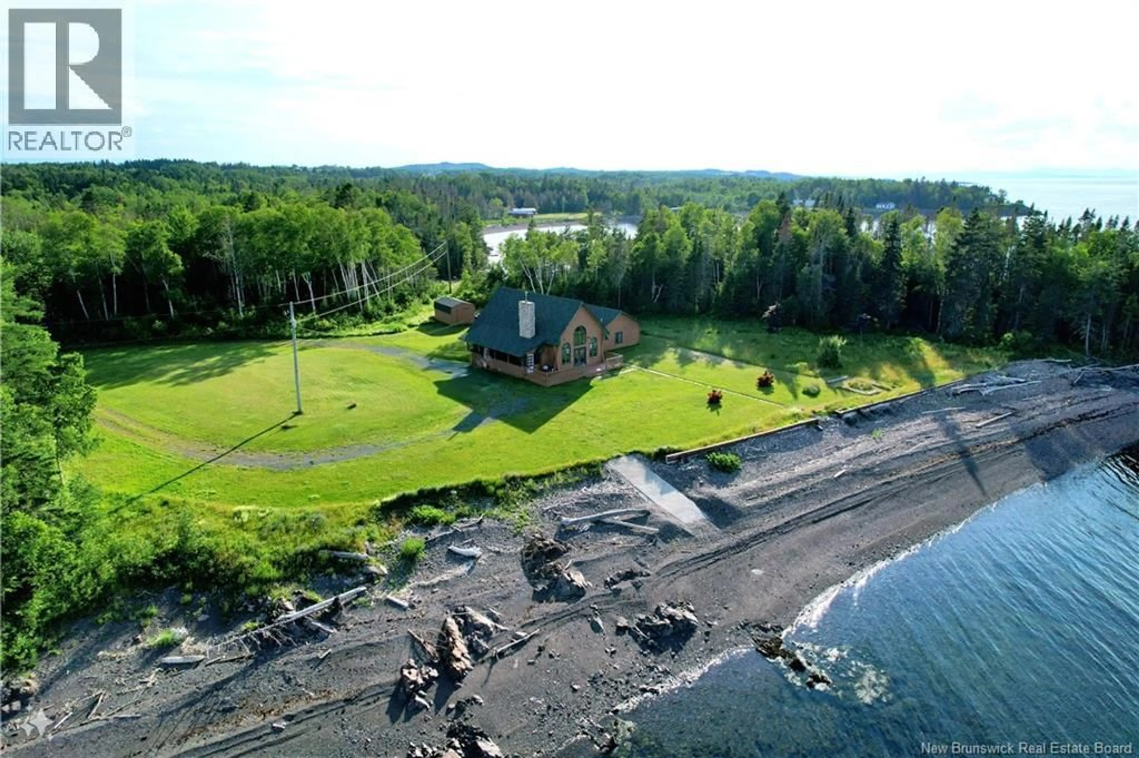 A pic from outside/outdoor area/front of a property/back of a property/a pic from drone, water/lake/river/ocean view for 41 MCNEIL, Sea Side New Brunswick E8G1T2